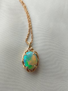 Australian Solid Black Opal Diamond Pendant in 18ct Yellow Gold
