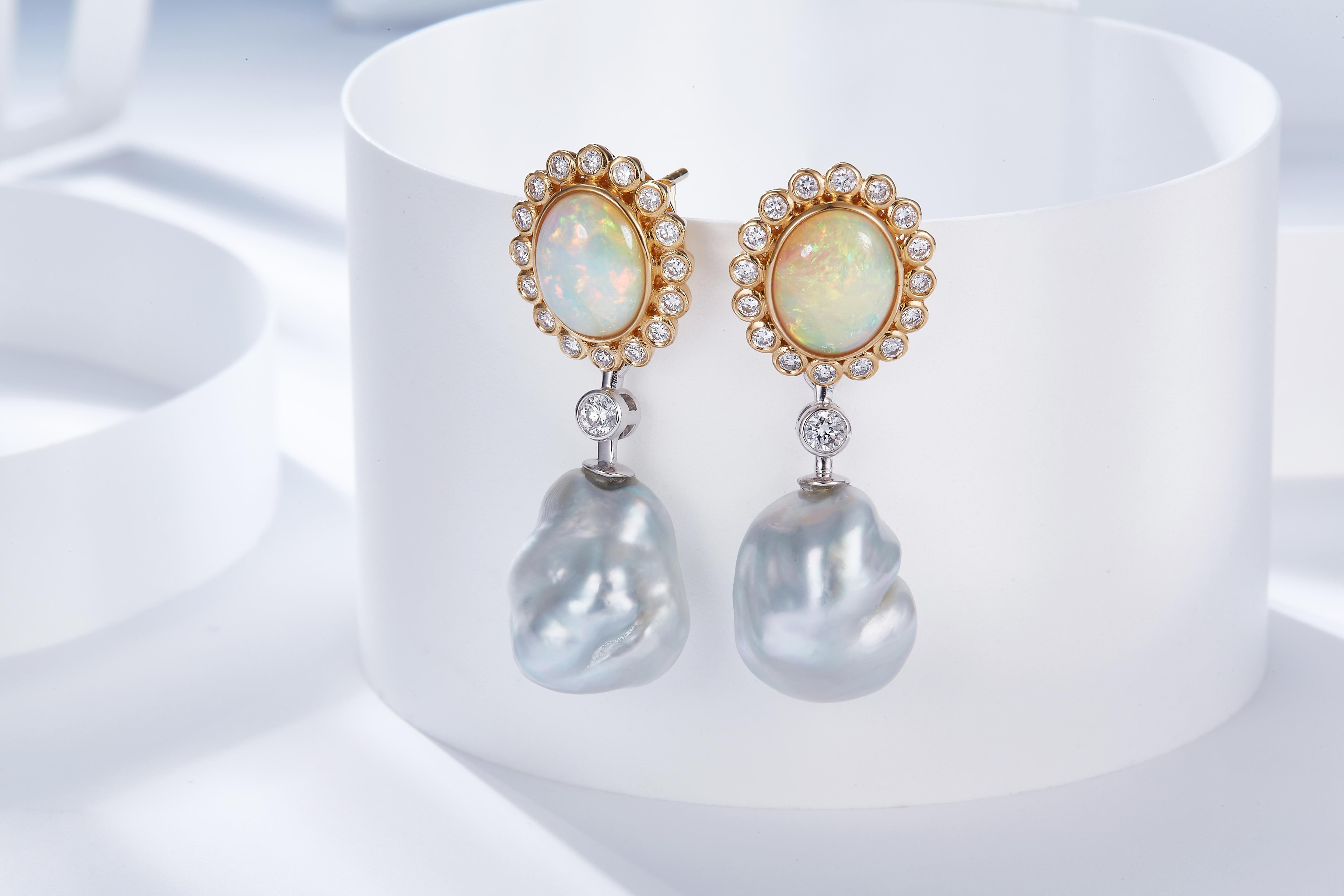 This is a pair of detachable earring consists of Solid Australian White Opal and massive Australian South Sea Baroque Pearl. The Pearls can be removed from the studs and you can wear the Solid White Opral diamond cluster by itself. It is a very
