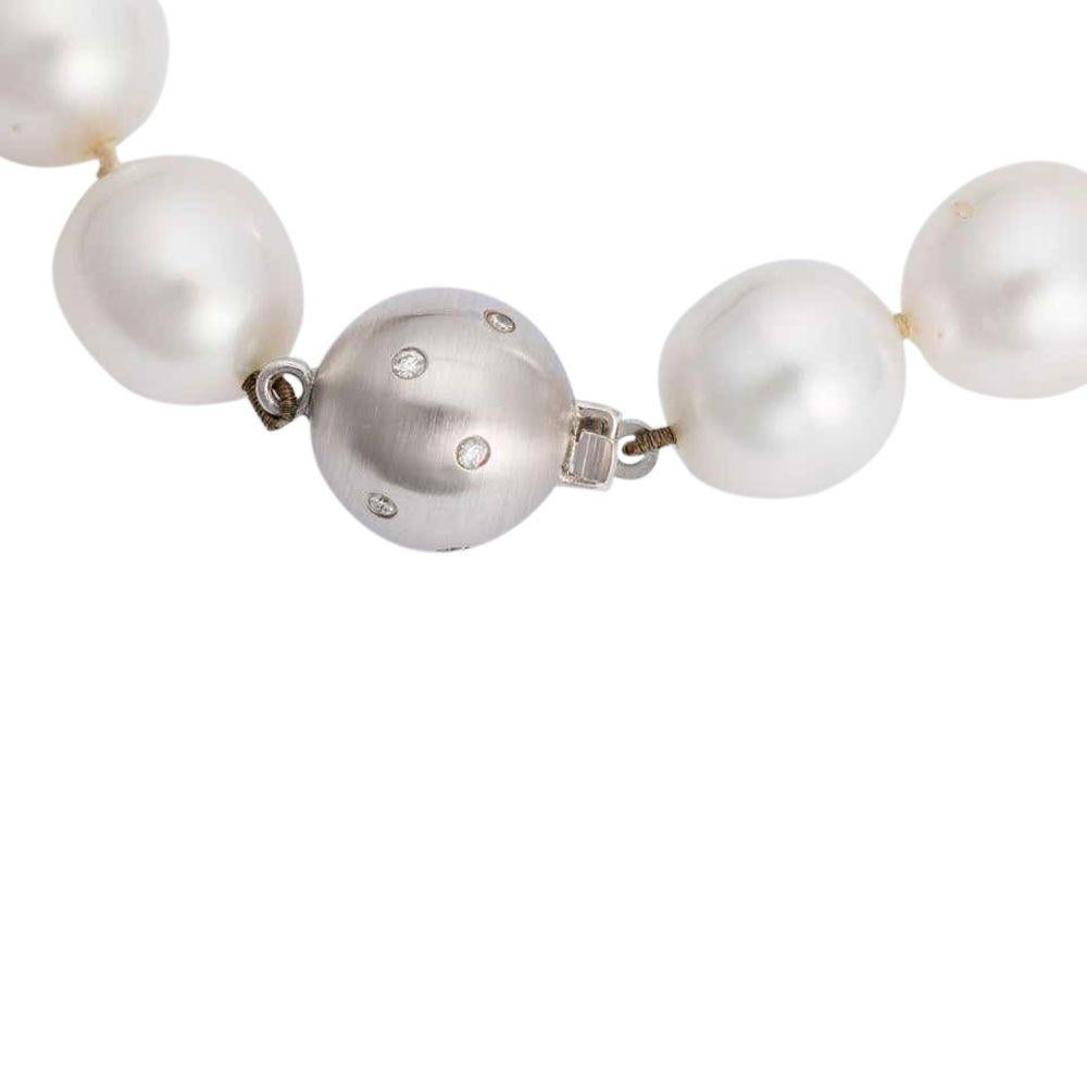 Oval Cut Australian South Sea Pearl Strand with 18 Karat White Gold and Diamond Set Clasp For Sale