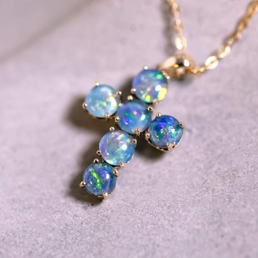 Australian Triplet Opal Cross Pendant Necklace 14K Yellow Gold.


Free Domestic USPS First Class Shipping! Free Gift Bag or Box with every order!

Opal—the queen of gemstones, is one of the most beautiful gemstones in the world. Every piece of opal