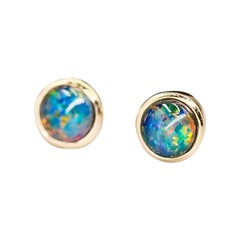 Ohrstecker mit australischen Triplet-Opal-Steinen aus 14-karätigem Gelbgold