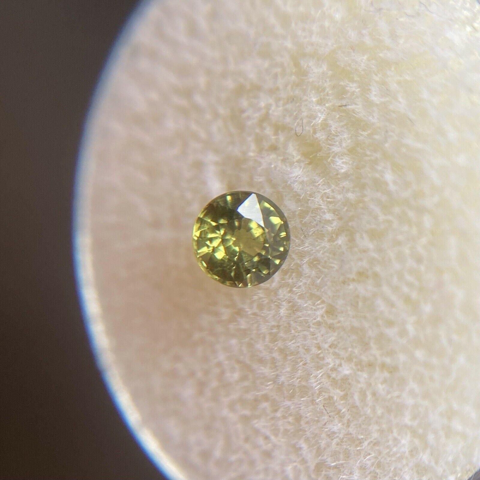 Australian Untreated Yellow Green Sapphire 0.53ct Round Cut Gem 4.4mm

Natural Australian Yellow Green Sapphire. 
0.53 Carat with a bright yellow green colour. Also has very good clarity, a clean stone with only some small natural inclusions