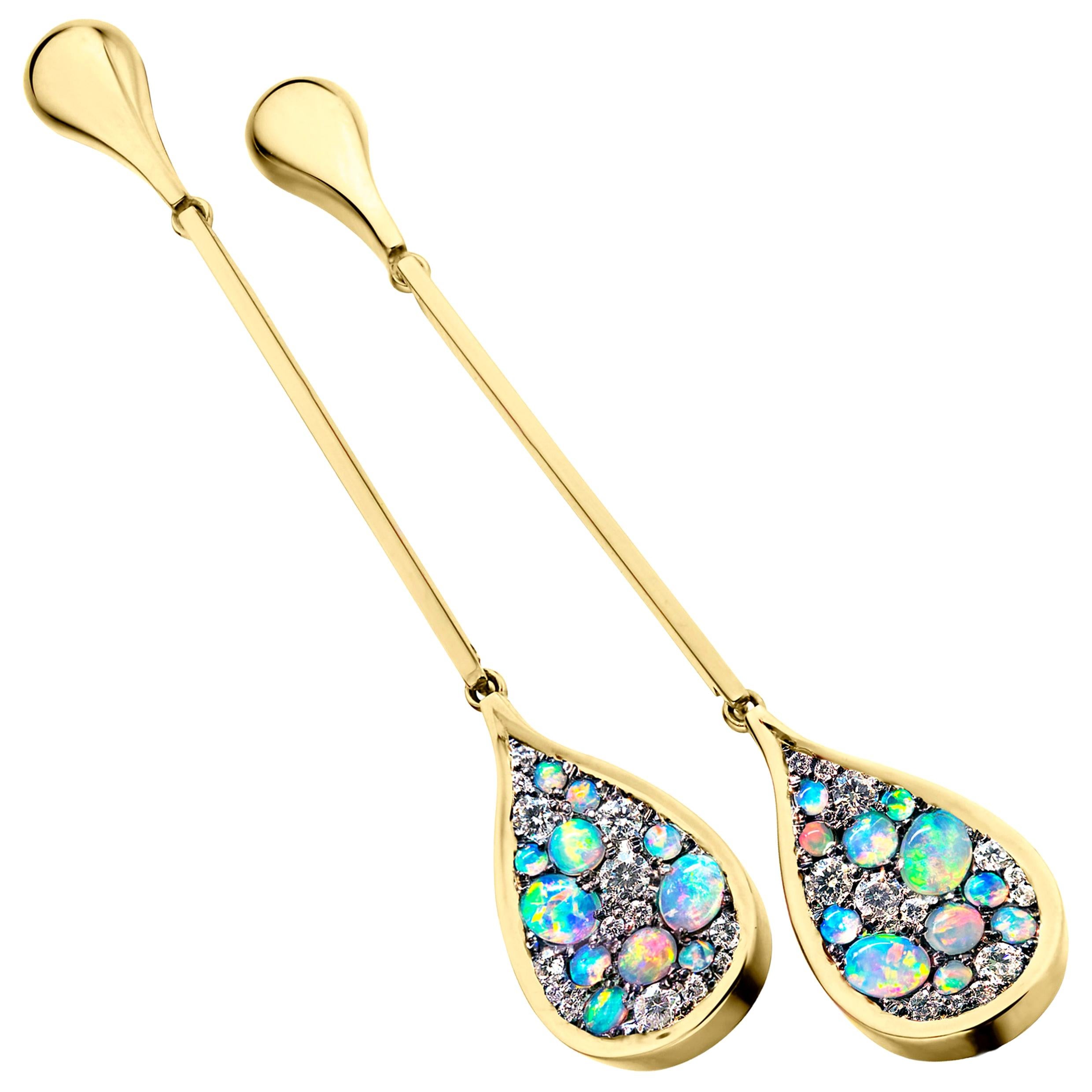 One of a kind earrings handmade in Belgium by jewelry artist Joke Quick, in 18K yellow gold 7,3 g & blackened sterling silver (The stones are set on silver to create a black background for the stones) Pave set with Australian white opal & white