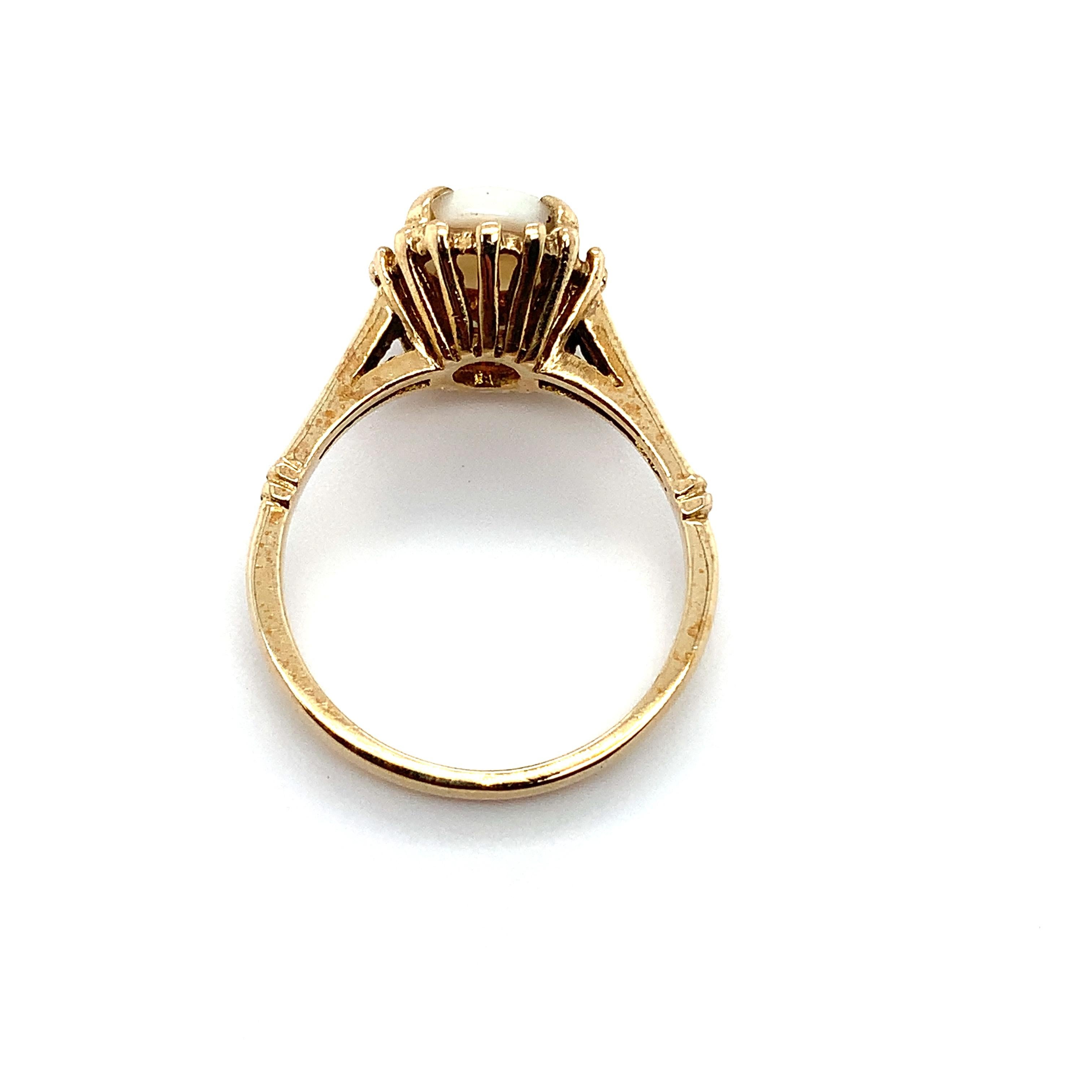 Oval Cut Australian white opal antique engagement ring 18k yellow gold For Sale