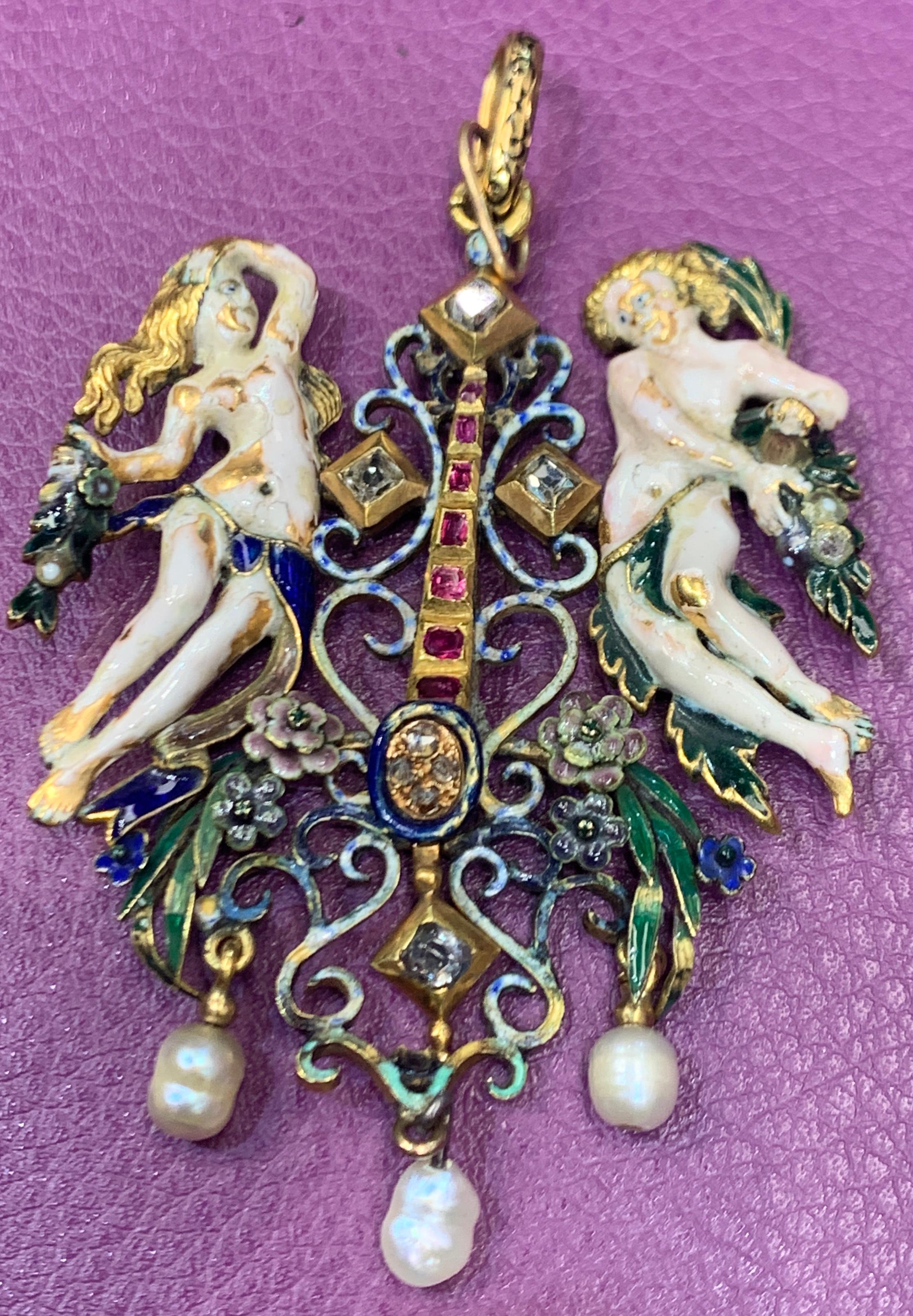 Österreich-Ungarische Renaissance-Revival-Adam-und-Eva-Brosche
Hergestellt um 1900
3 Perlen
8 Diamanten
7 Rubine
Abmessungen: 3