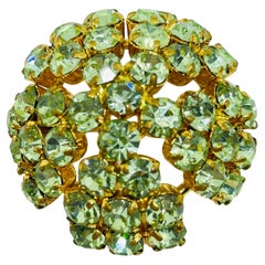 Spilla firmata AUSTRIA con strass d'epoca in tono dorato