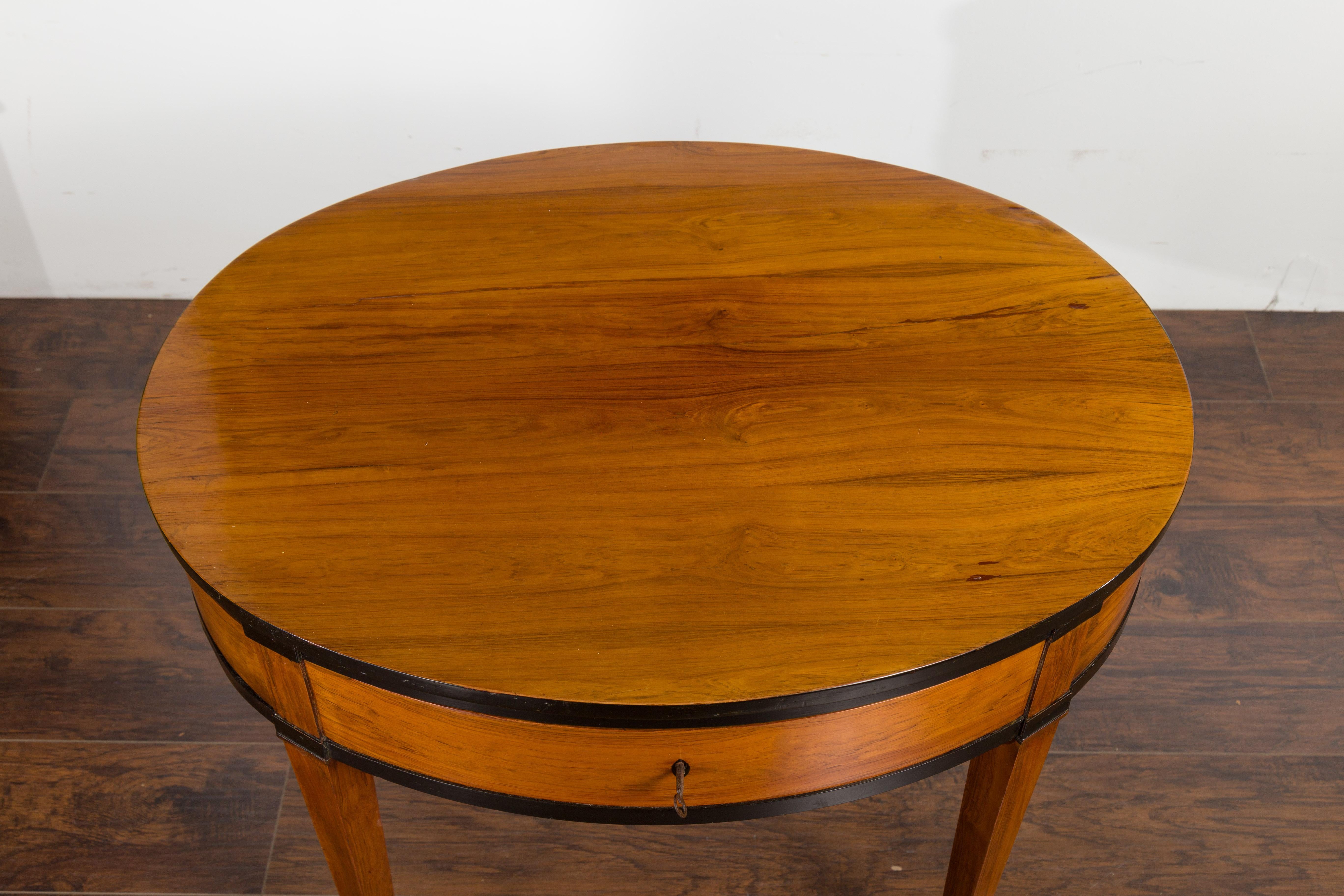 Brass Austrian 1840s Biedermeier Oval Top Table with Drawer and Ebonized Accents