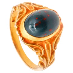 Austrian 1890 Art Nouveau Ring In 18Kt Yellow Gold With Oval Bloodstone