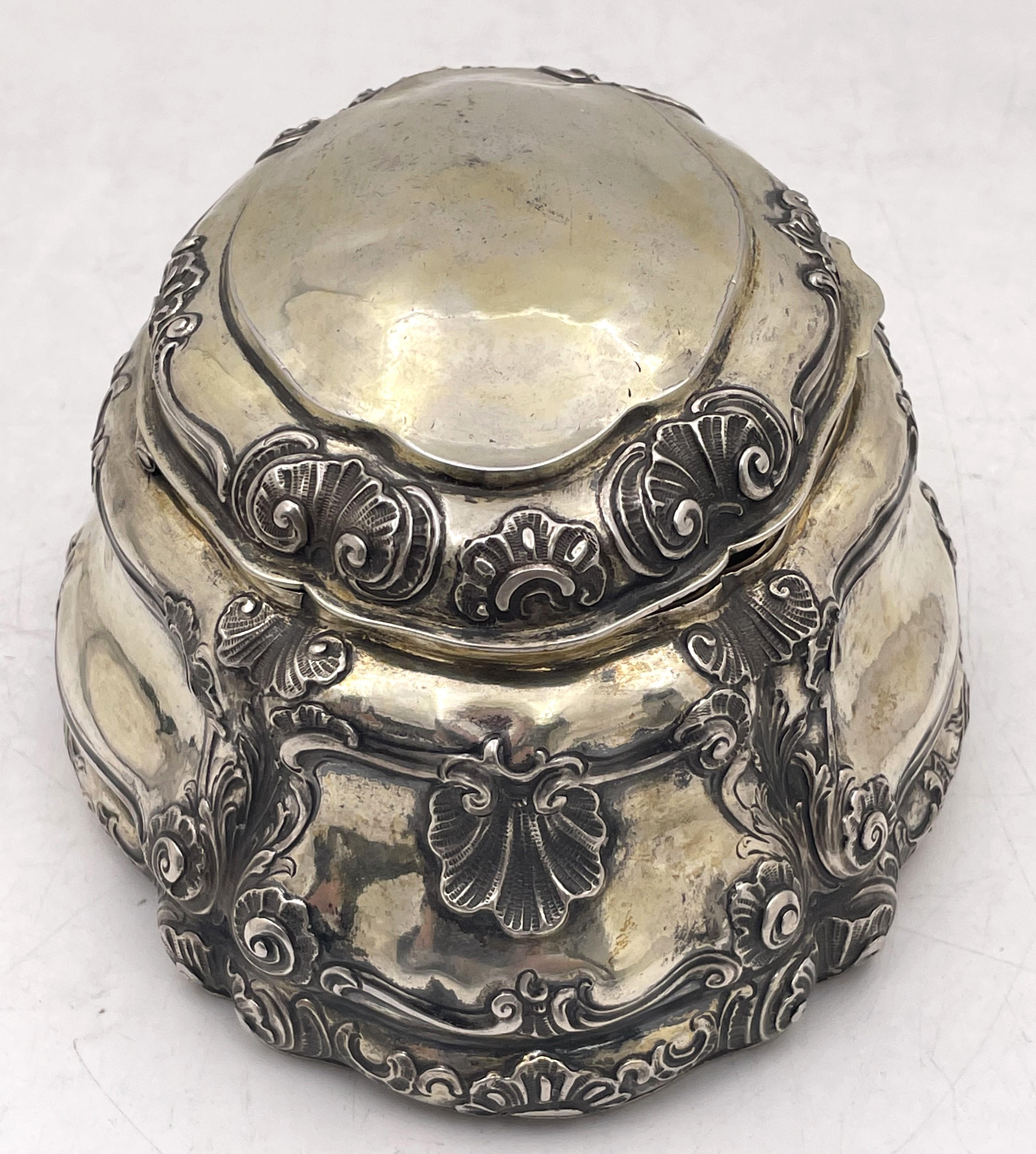 Austrian 18th or early 19th century gilt continental silver box, beautifully adorned with curvilinear and shell motifs, measuring 7'' in length by 5 1/3'' in depth by 3 2/3'' in height, weighs 15 troy ounces, and bears hallmarks as shown. Perfect as