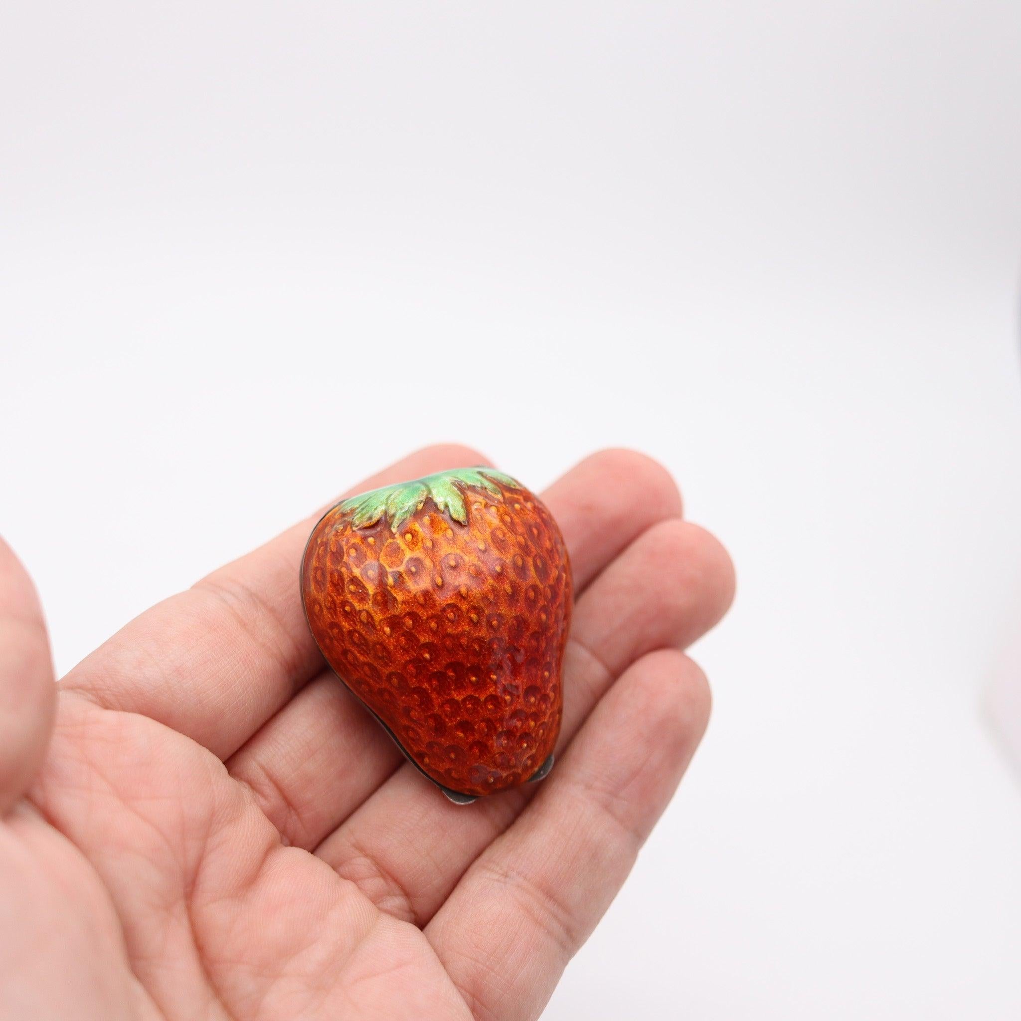 An enameled strawberry shaped pill box made in Austria

This is a gorgeous and amazing pill box created during the art-nouveau period in Austria between the 1910 and 1915. This box has been crafted in the shape of a real strawberry in solid