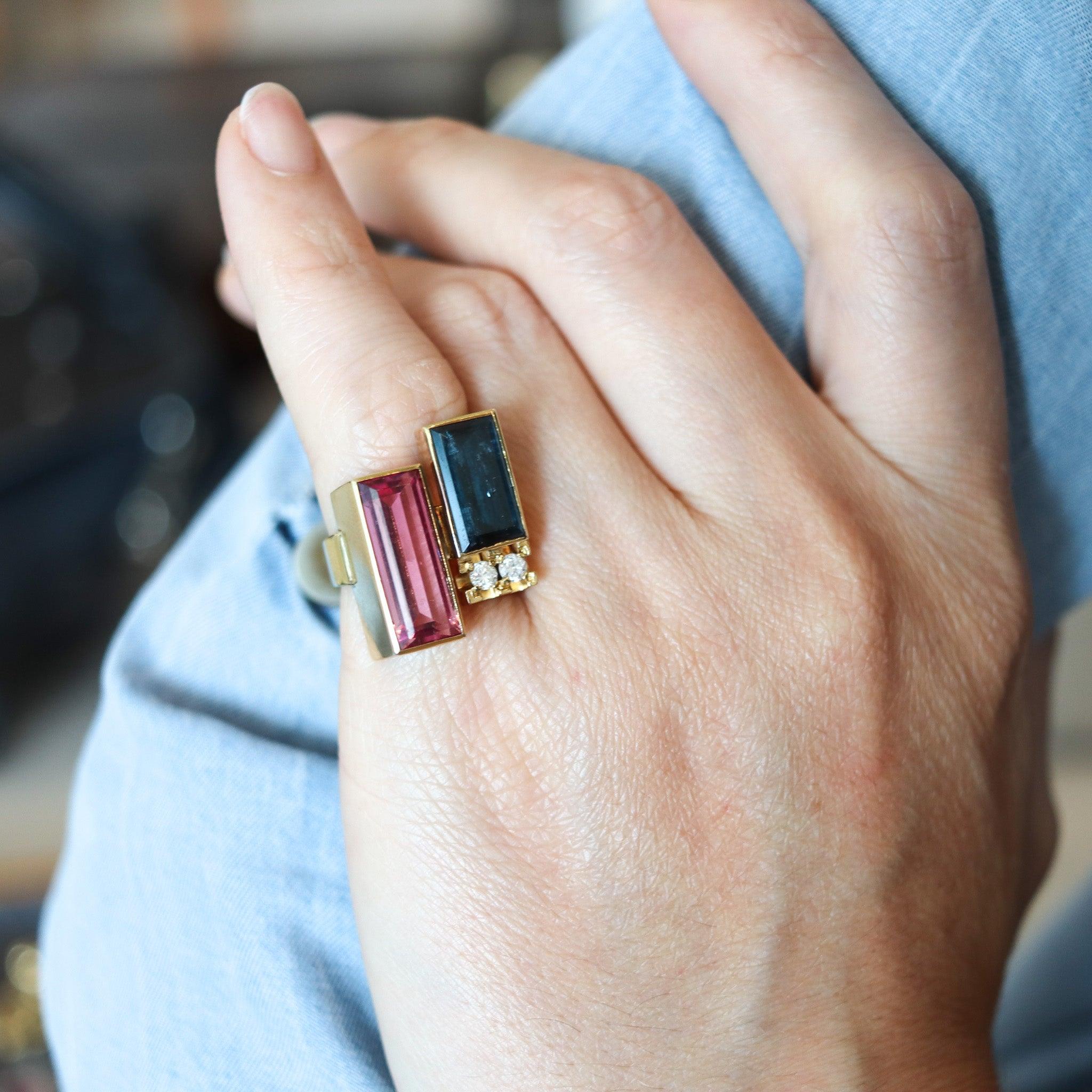 An Austrian modernist geometric cocktail ring 

A statement geometric cocktail ring, created in Vienna Austria, back in the 1970. The ring has been crafted as a kind of toi et moi with modernist patterns in solid yellow gold of 14 karats with high