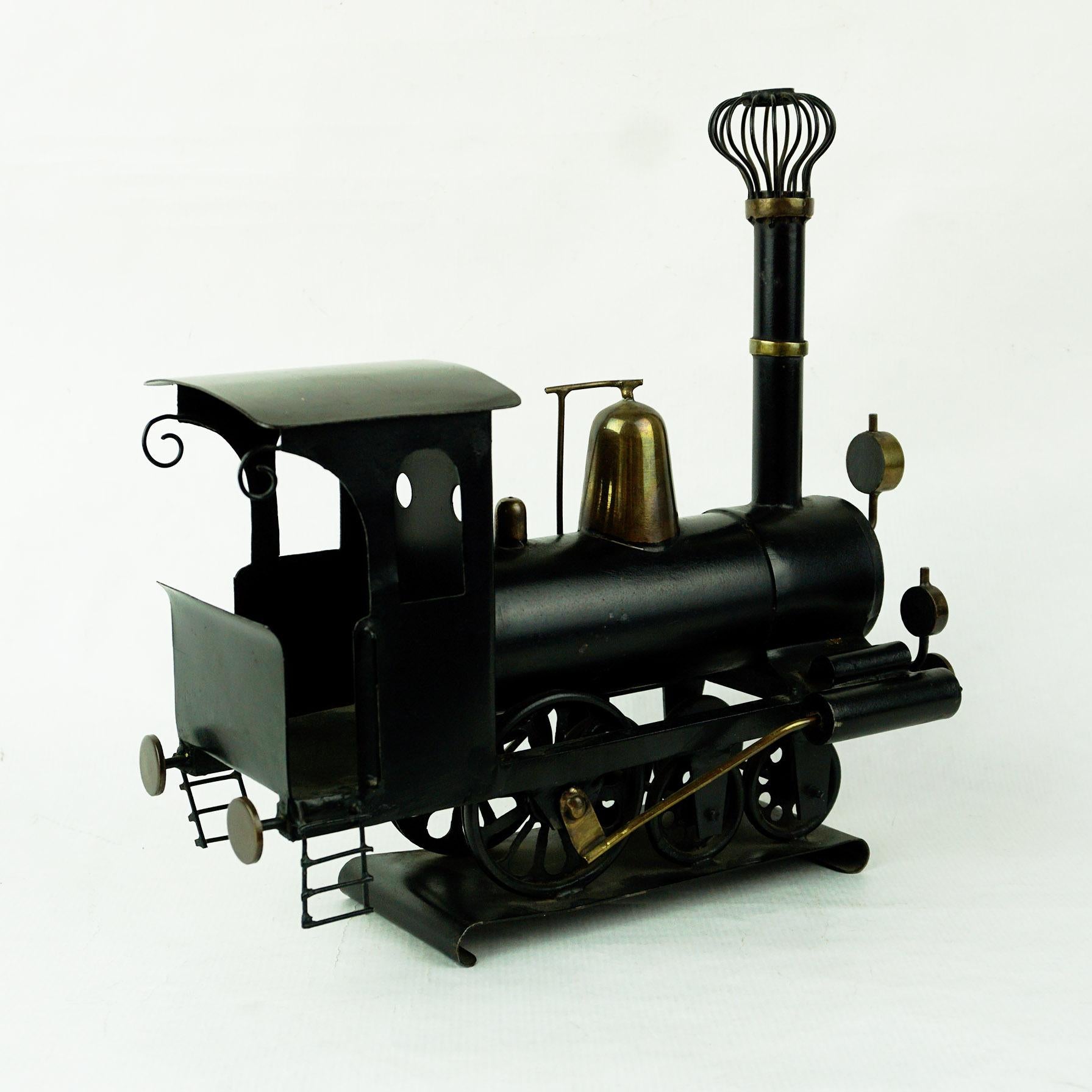 Austrian Midcentury Brass and Black Metal, Locomotive by Hagenauer Vienna For Sale 1