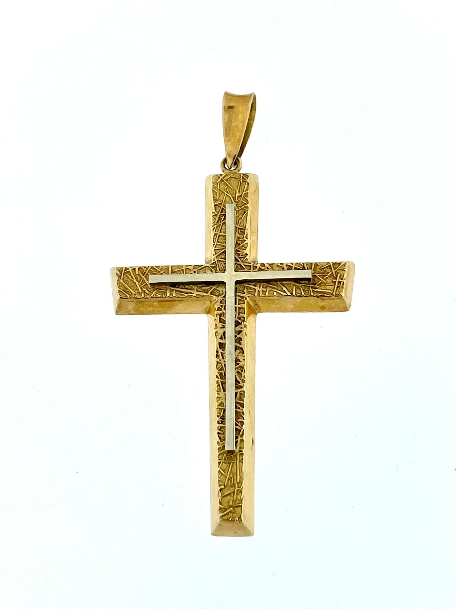 The Austrian Antique 18kt Gold Cross is a stunning piece of religious jewelry with intricate details. 

This exquisite cross is crafted from 18-karat gold, showcasing the exceptional craftsmanship of Austrian artisans. The cross features a unique