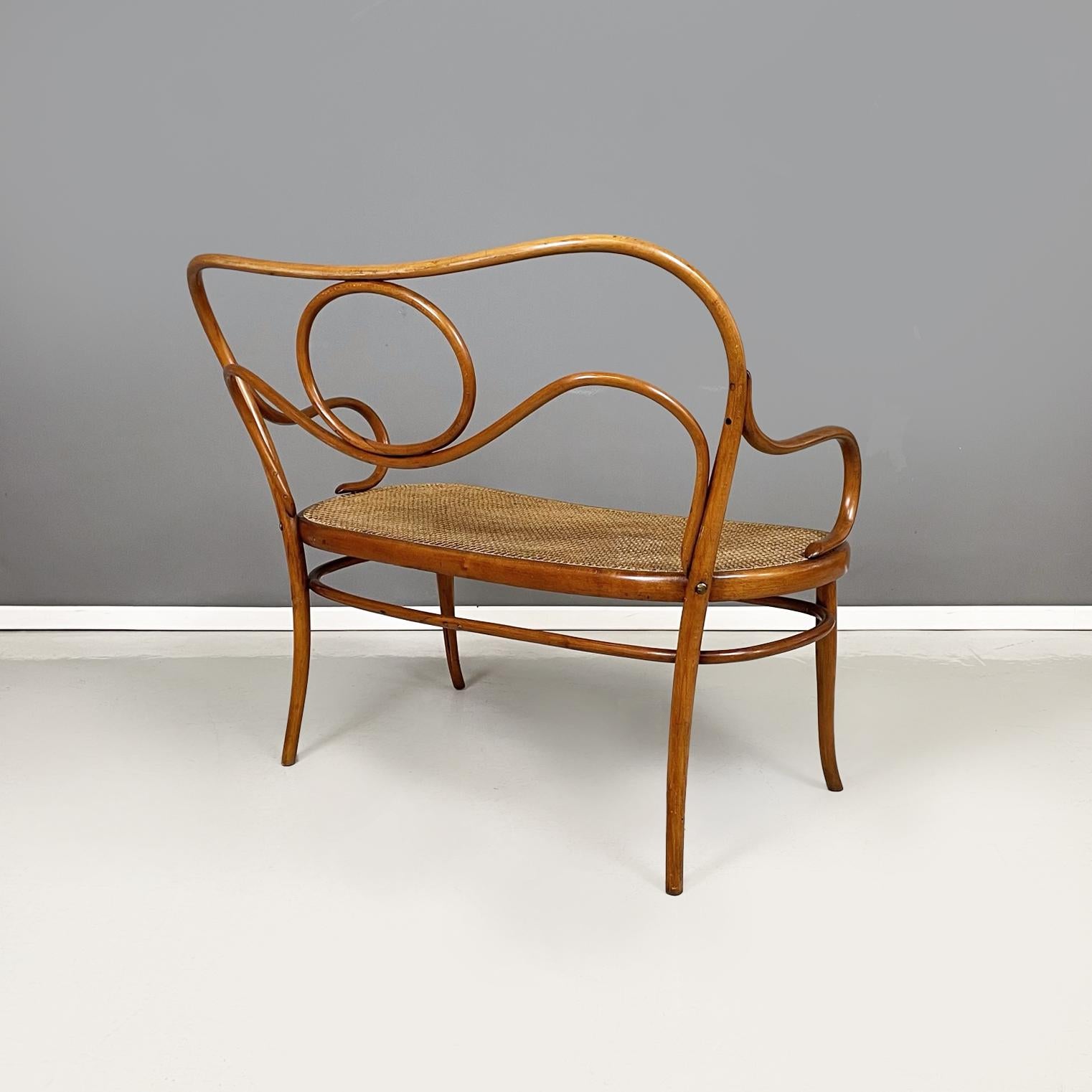 20th Century Austrian antique Wooden and Vienna straw two-seater bench by Thonet, early 1900s