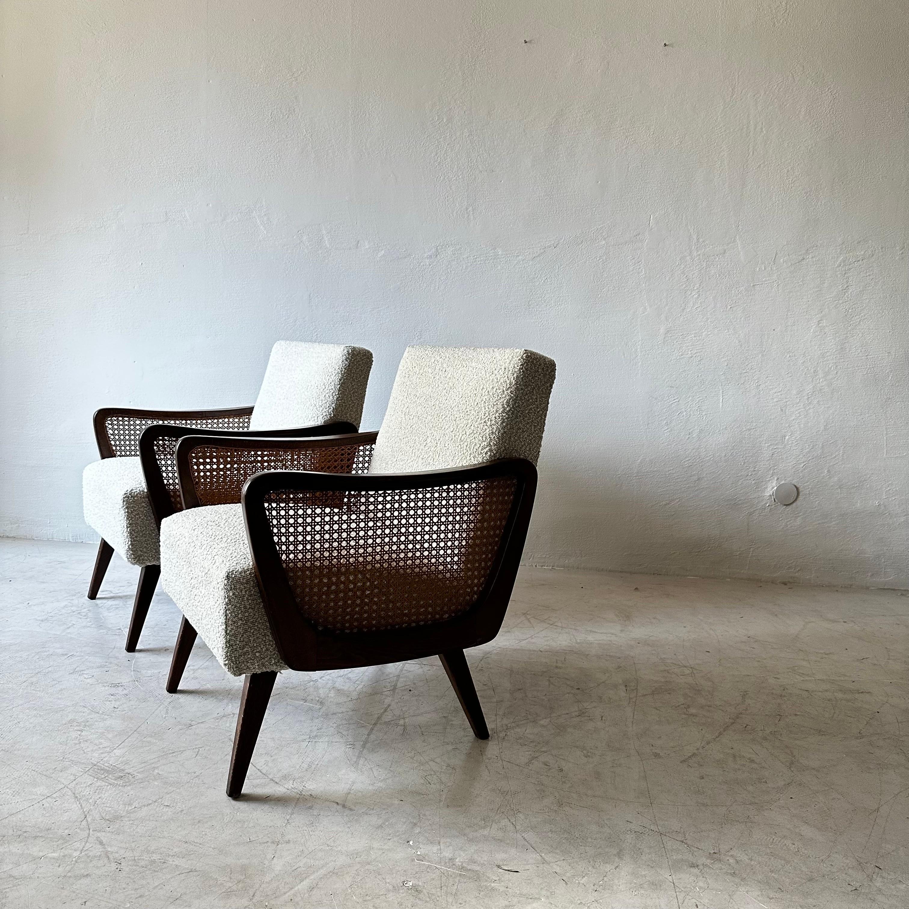 Austrian Arm Chairs in Boucle and Wicker.