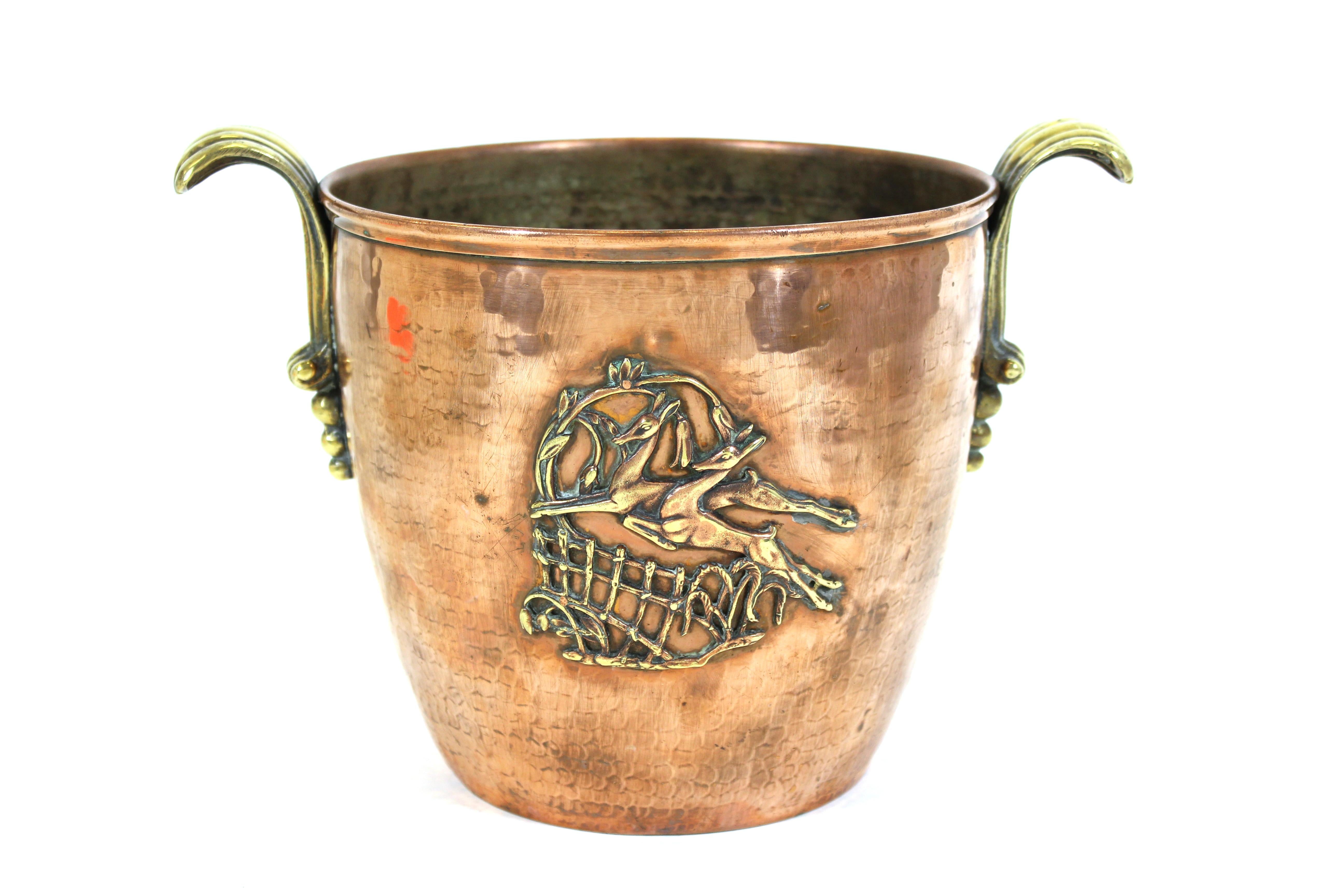 Austrian Art Deco copper and brass champagne or wine bucket with gazelle decoration on both sides and elegant brass handles. In great vintage condition with age-appropriate wear.