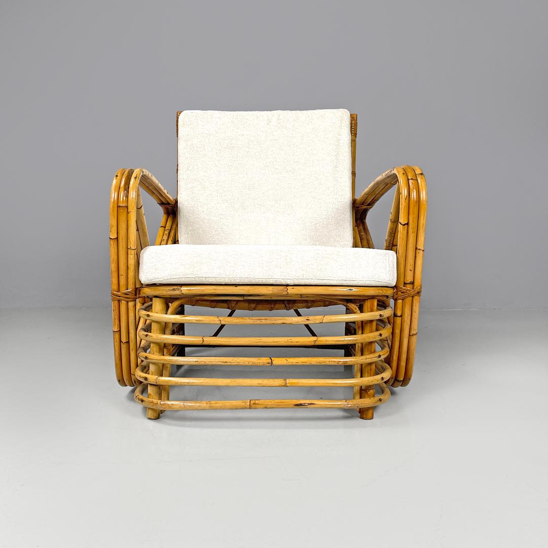 Poltrone austriache Art Deco in rattan e tessuto bianco di Paul Frankl, anni '40
Coppia di poltrone in rattan con seduta e schienale imbottiti e rivestiti in tessuto bianco. La struttura è composta da due braccioli con decorazioni a 