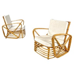 Vintage Austrian Art Deco rattan and white fabric armchairs by Paul Frankl, 1940s
