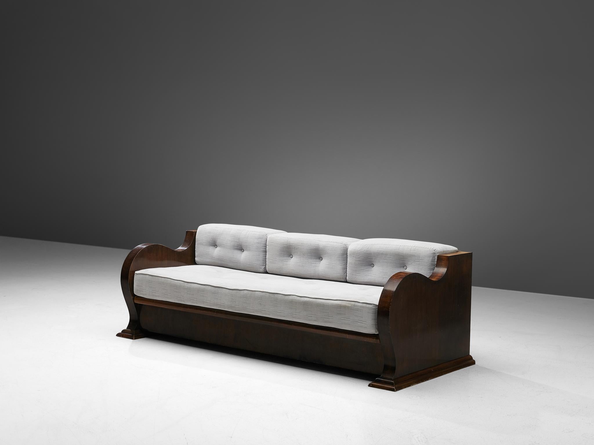 Sofa-bed, walnut, fabric, Austria, 1930s

An Art Deco sofa with loose cushions to turn it easily into a daybed. The design features a sturdy, strong walnut veneered frame with large curvaceous armrests. The legs are short and form a balanced whole