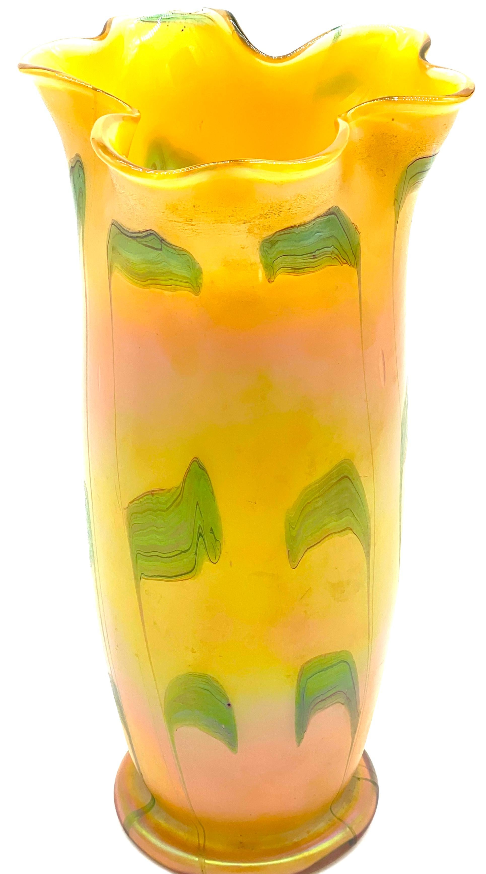 Austrian Art Nouveau Loetz Art Glass Vase with Crimped Rim 
Austria, 20th Century 

An exquisite Austrian Art Nouveau  Loetz art glass vase, 20th century is a fine representation of the period's organic aesthetic. Standing 13 inches high with a