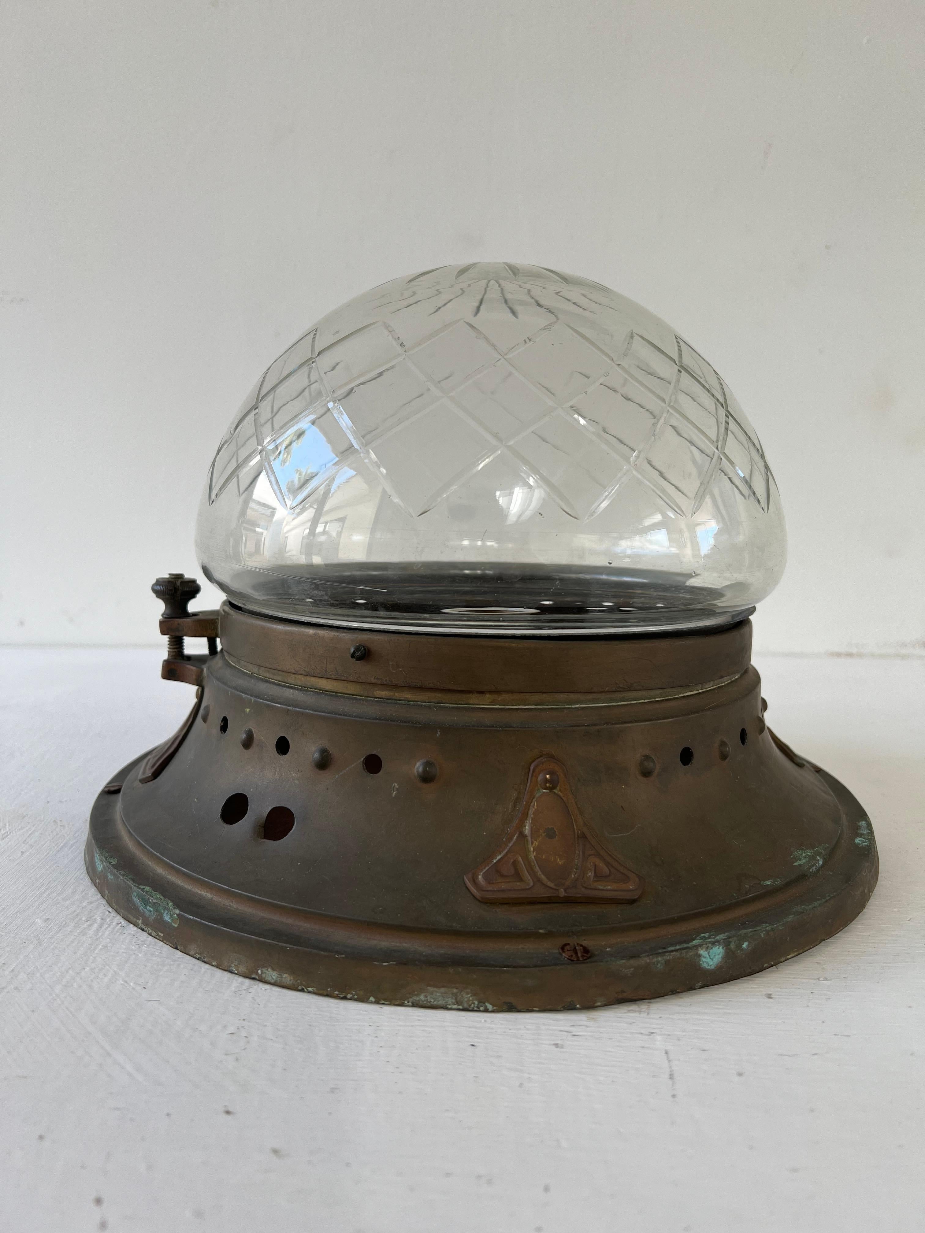 Charming copper flush mount or sconce, with a hand blown, cut glass globe.
The copper (could be brass? ) has great patina, you can see some green spots, these can be removed but then the whole lamp would have to be polished as to look consistent,