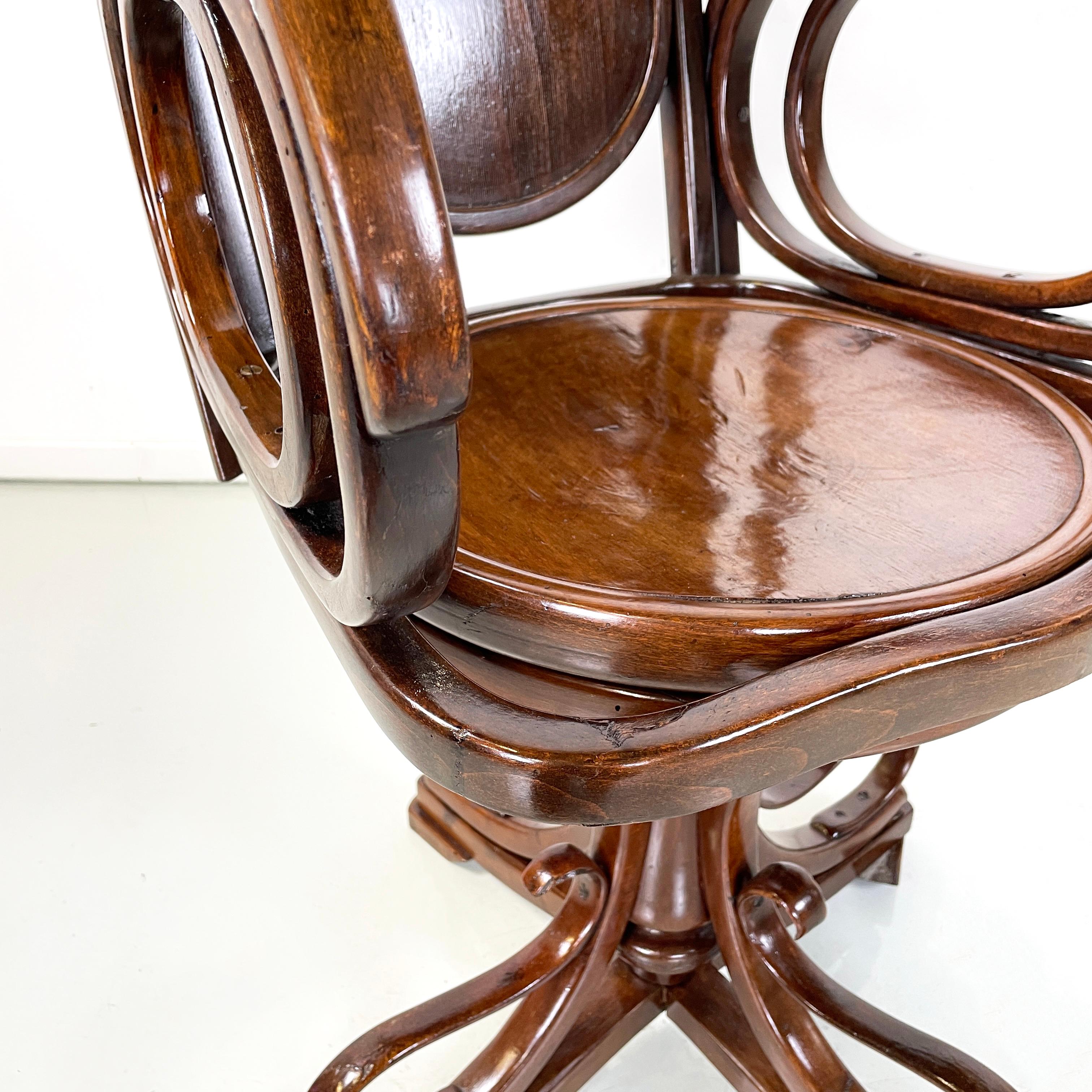 Austrian Art Nouveaux Swivel chair with armrests in wood by Thonet, early 1900s For Sale 5