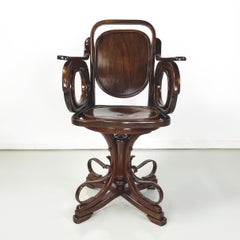 Austrian Art Nouveaux Swivel chair with armrests in wood by Thonet, early 1900s