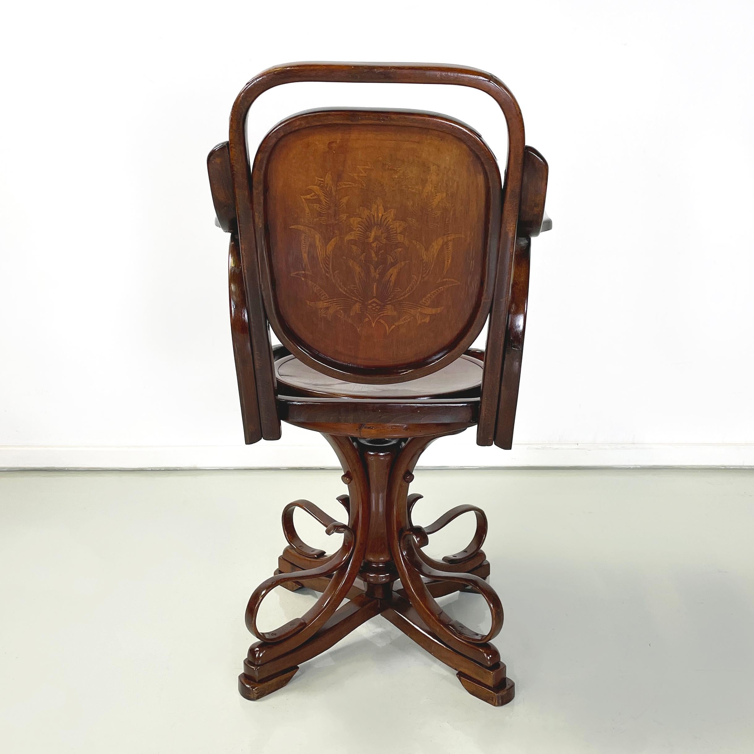 Wood Austrian Art Nouveaux Swivel chair with armrests in wood by Thonet, early 1900s For Sale