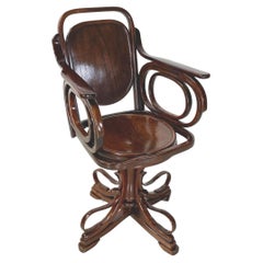 Chaise pivotante Art Nouveaux autrichienne avec accoudoirs en bois par Thonet, début des années 1900