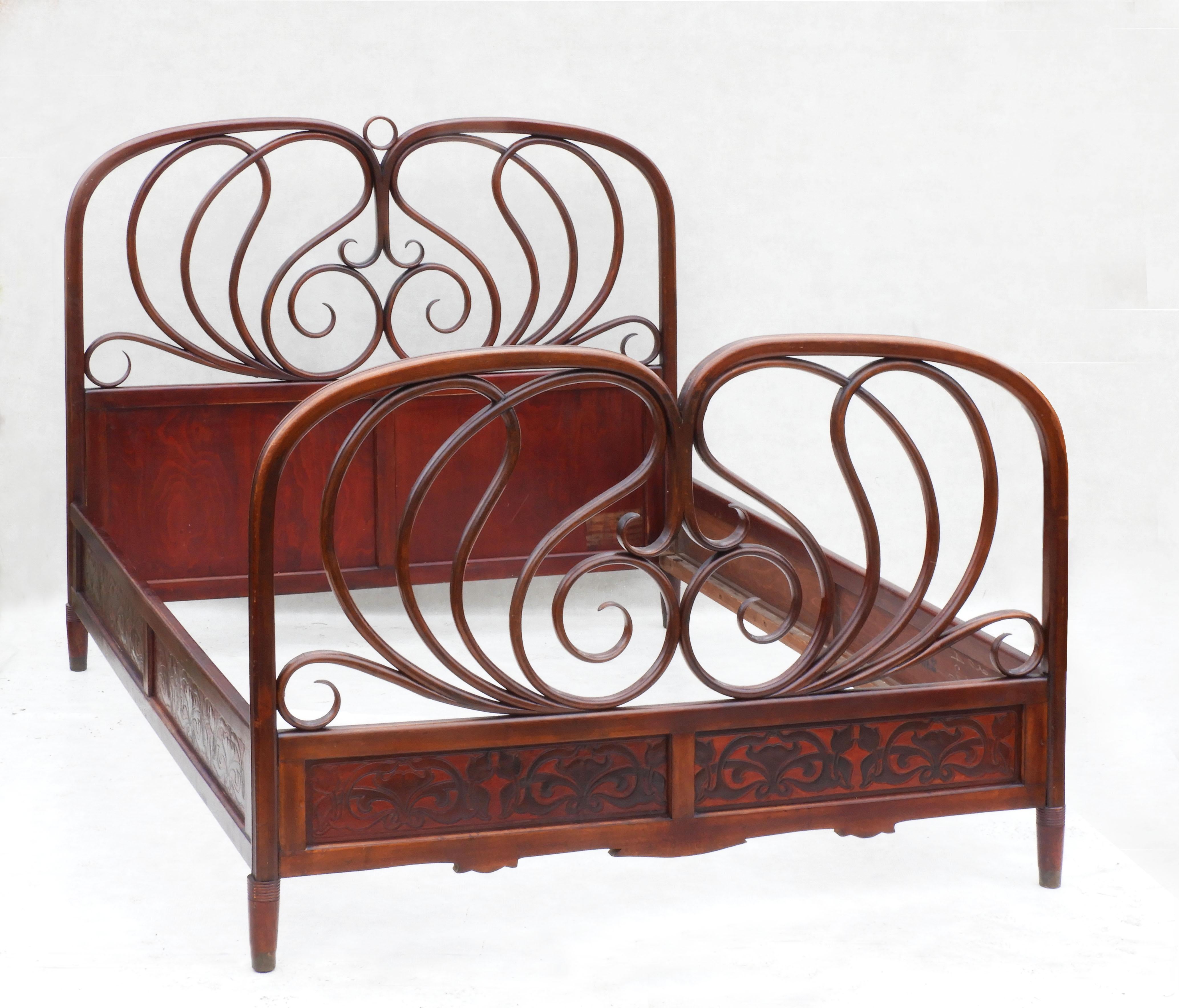 Austrian Bentwood Bed Designed by J & J Kohn C1900. 
A beautiful mahogany-stained bentwood bed frame in good original condition with nice age patina.
Dimensions: 
Headboard height: 128cm/50.39in 
Footboard height: 100cm/39.37in 
Length: