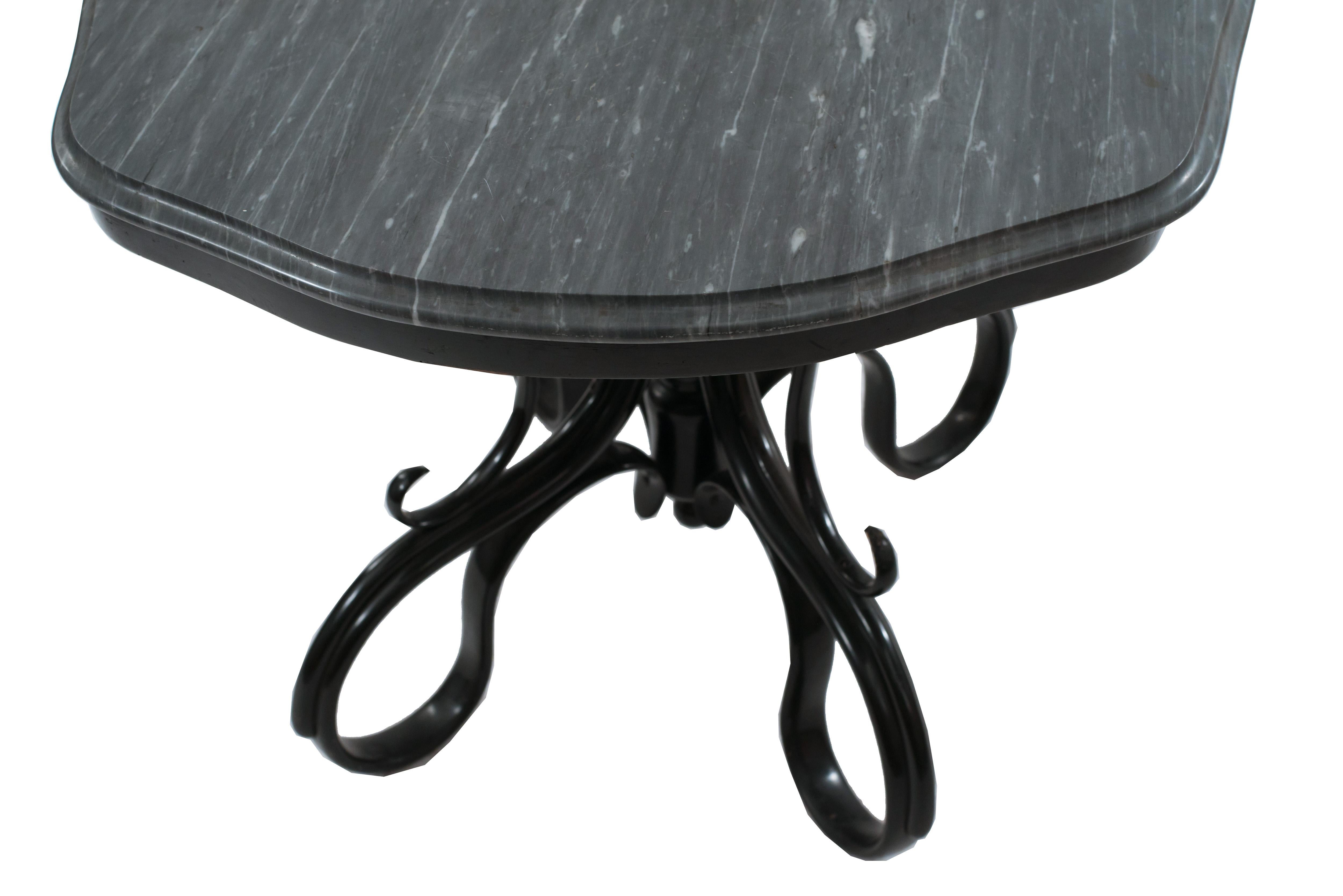 Austrian Bentwood (Late 19th Century) occasional /dining table with ebonized pedestal base and legs supporting a gray shaped rectangular marble top (MICHAEL THONET)

