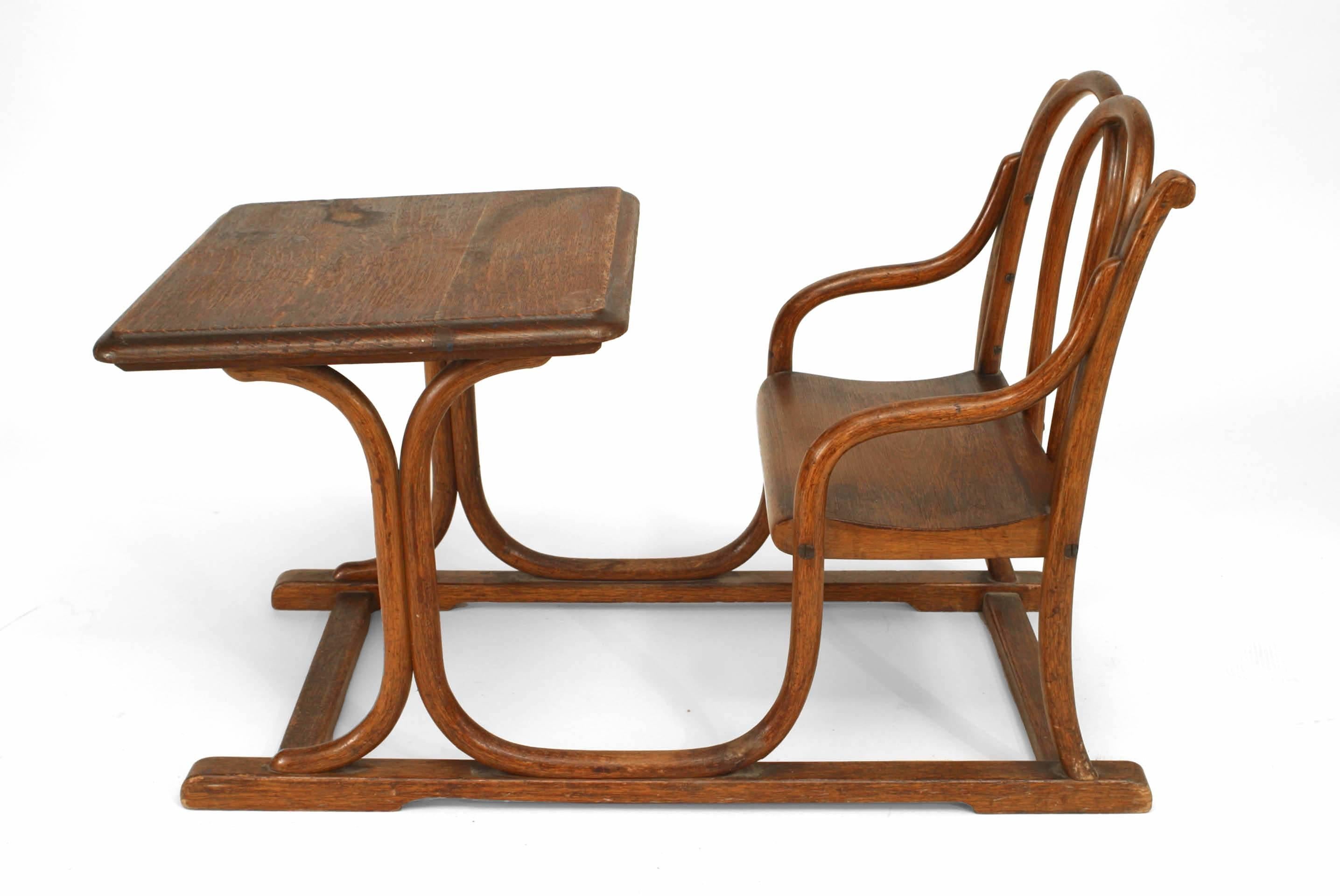 Austrian Bentwood small child's desk with attached chair with double hoop back design. (THONET label and brand)
