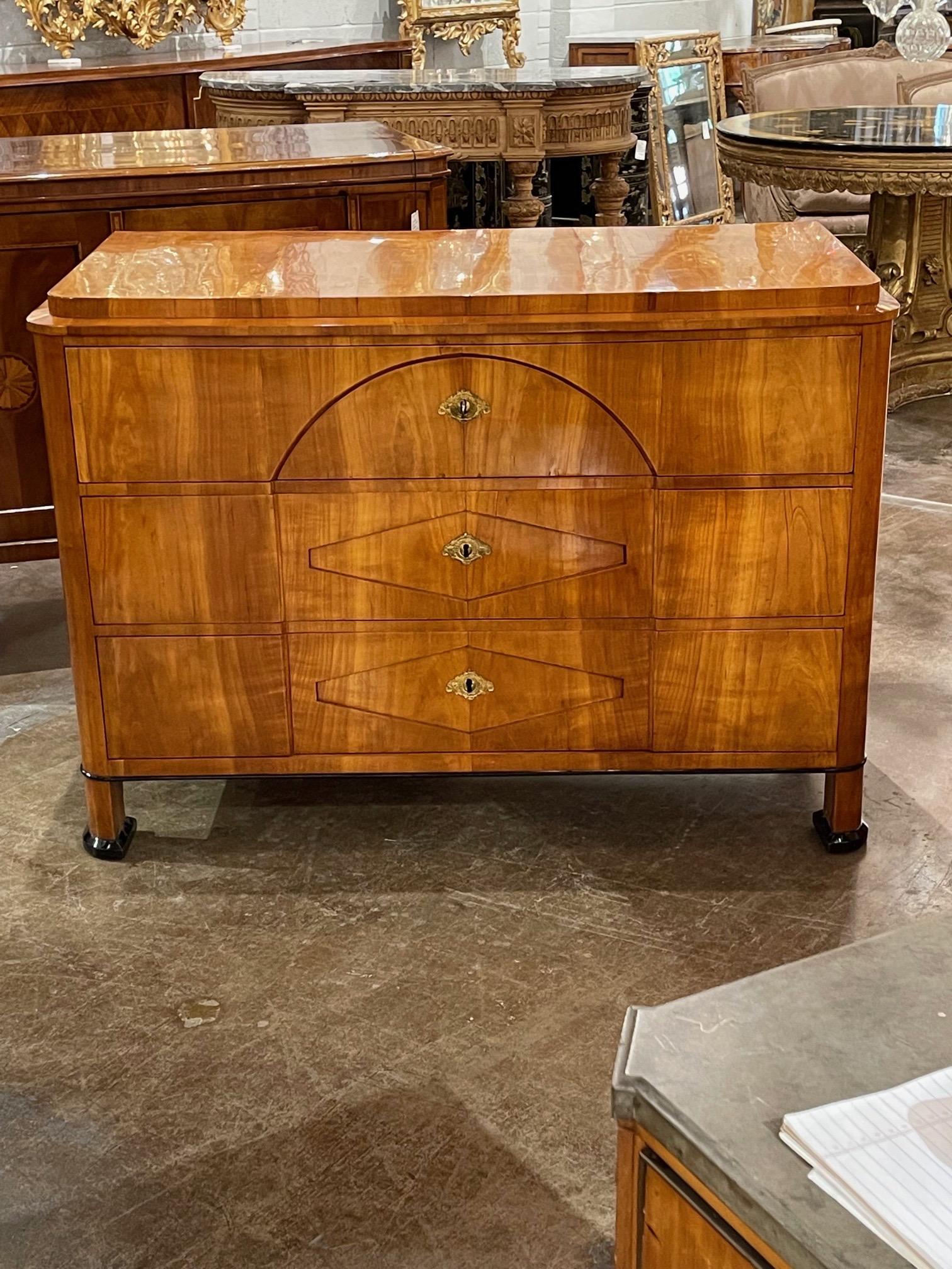 Outstanding Austrian Biedermeier classical style walnut commode. Beautiful polished wood along with superb quality and craftsmanship. Stunning!!