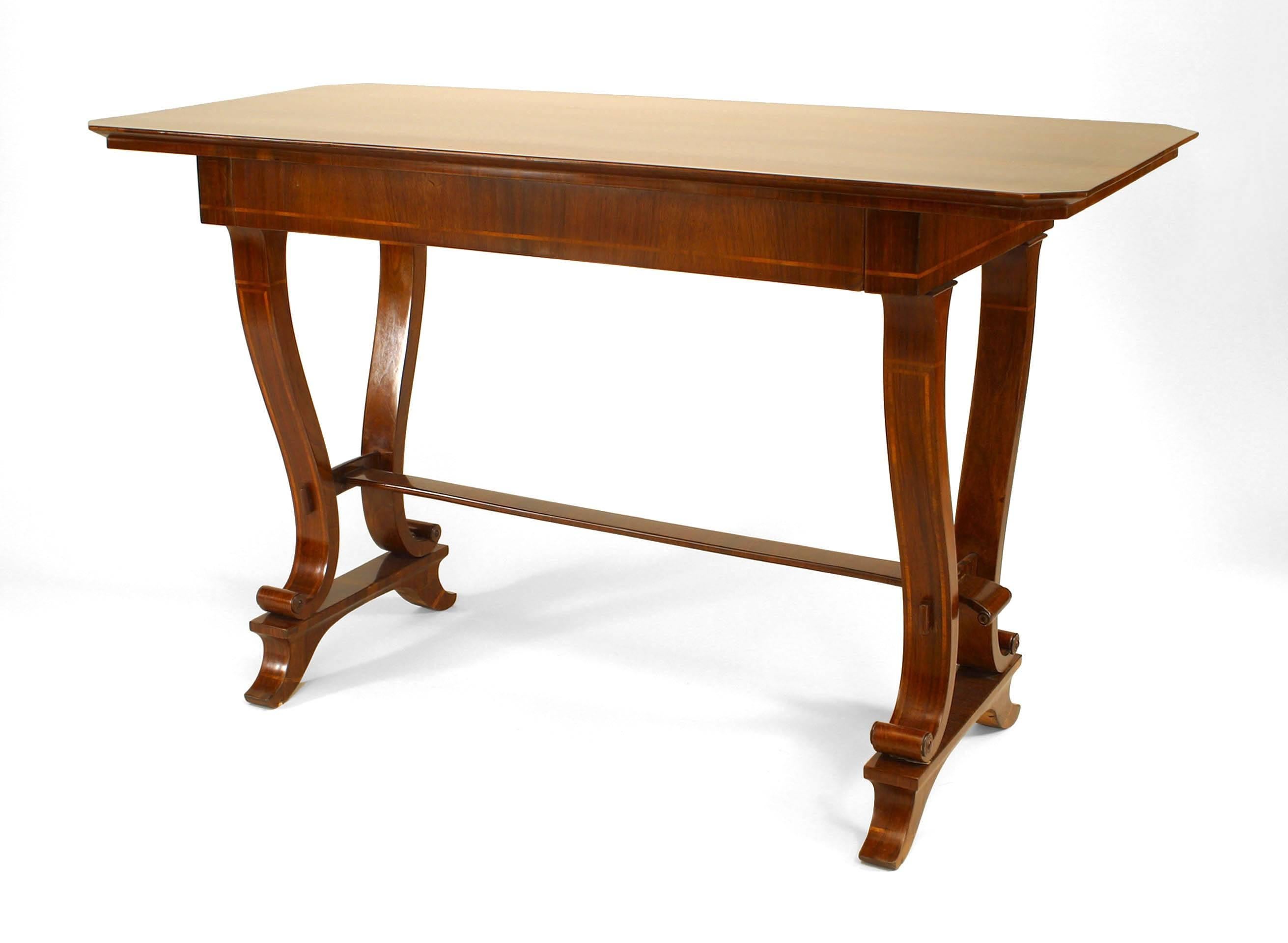 Austrian Biedermeier (Circa 1825) walnut and inlaid trimmed davenport table desk with single drawer and stretcher with double pedestal base supports.
