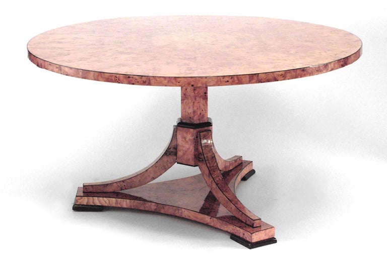 Austrian Biedermeier (Circa 1830) round burl maple veneer & ebonized trimmed dining table with sunburst design and tilt top on pedestal base with 3 legs ending on triangular platform
