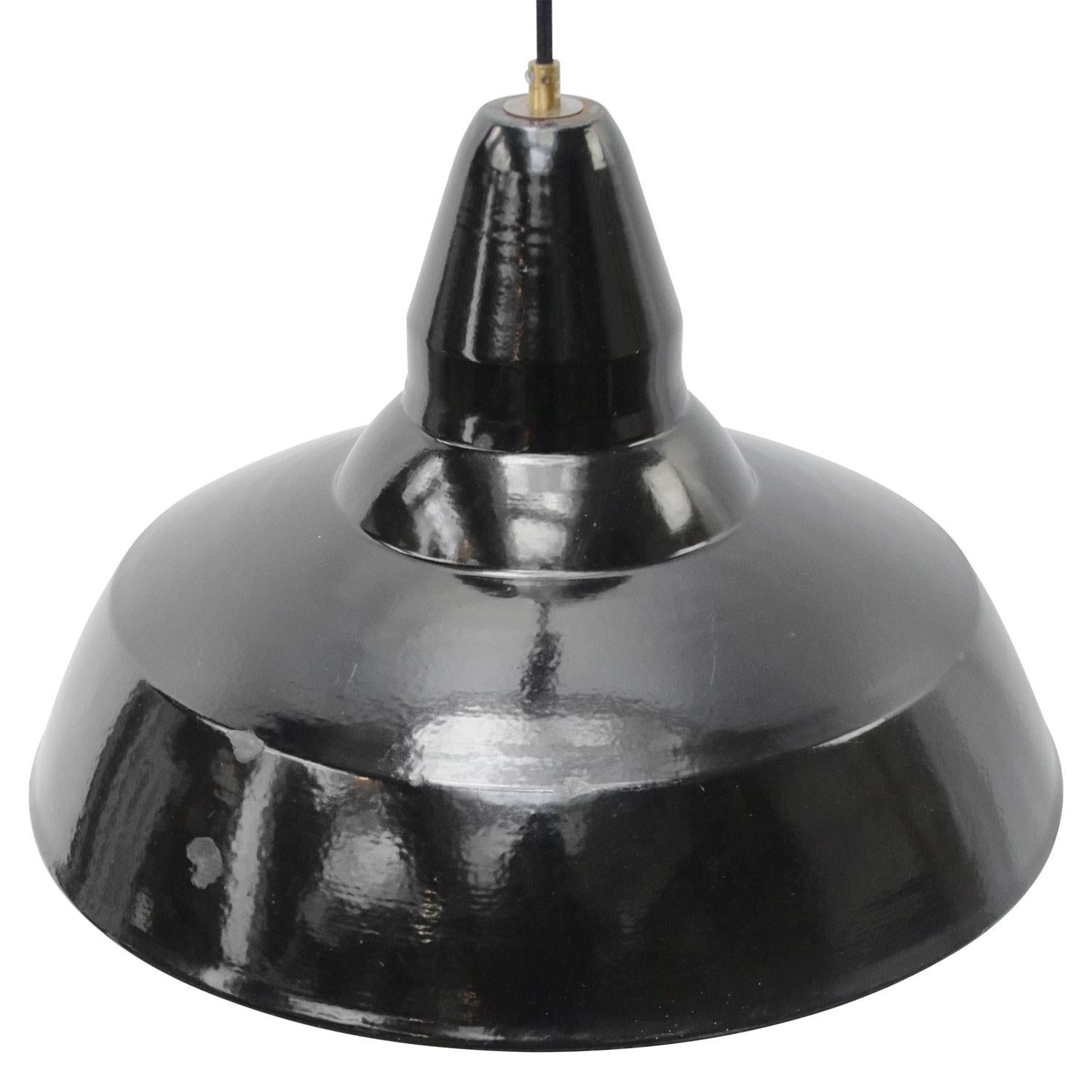 Rare Austrian industrial pendant lamp.
Black enamel, white inside

Weight: 1.80 kg / 4 lb

Priced per individual item. All lamps have been made suitable by international standards for incandescent light bulbs, energy-efficient and LED bulbs.