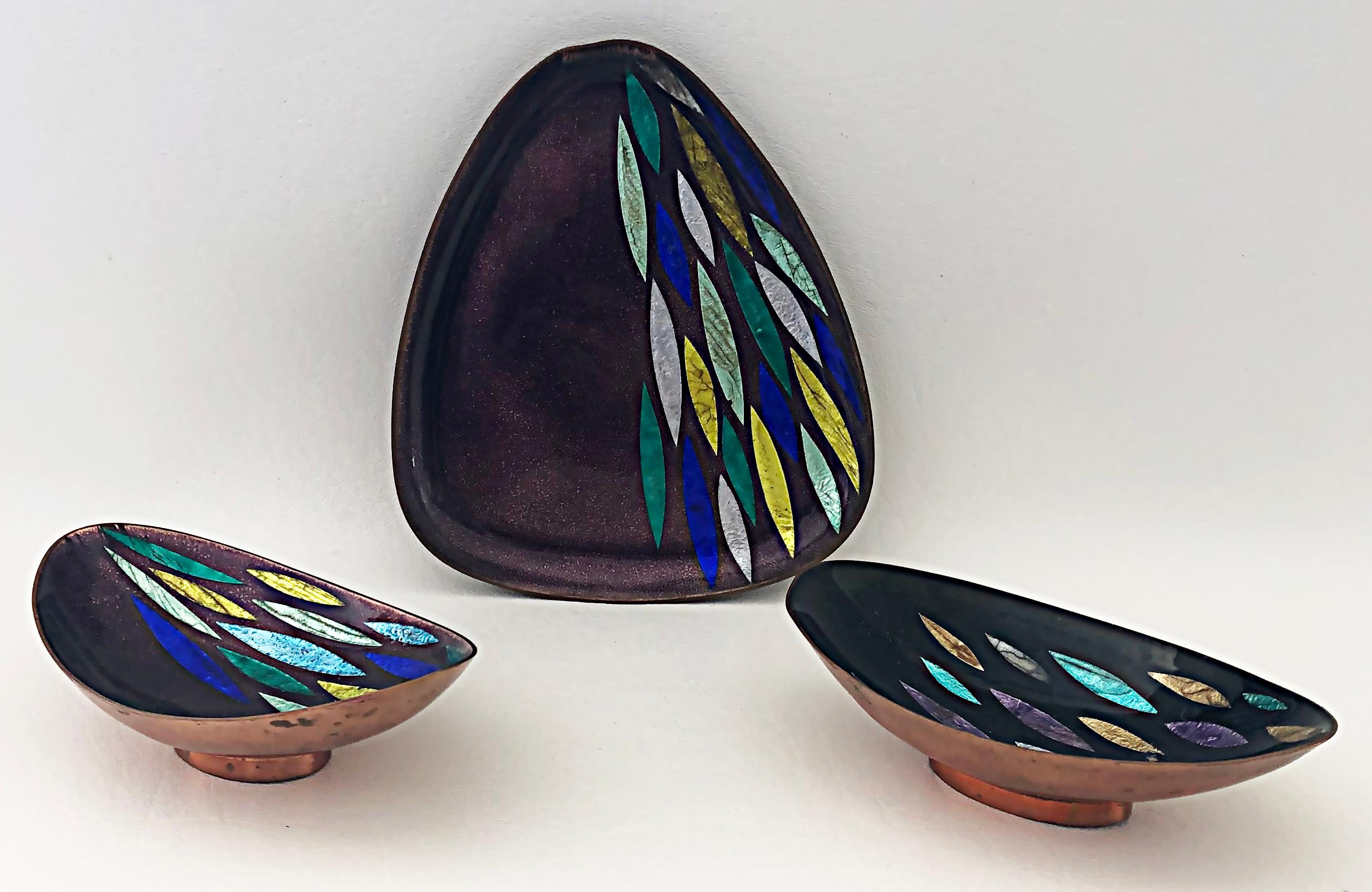 Austrian black, Starr & Gorham Enamel copper bowls, Vienna, Set of 3

Offered for sale is a set of three Black Starr & Gorham enameled copper bowls. They are designed in oval and triangular shapes with soft rounded edges and are embellished with