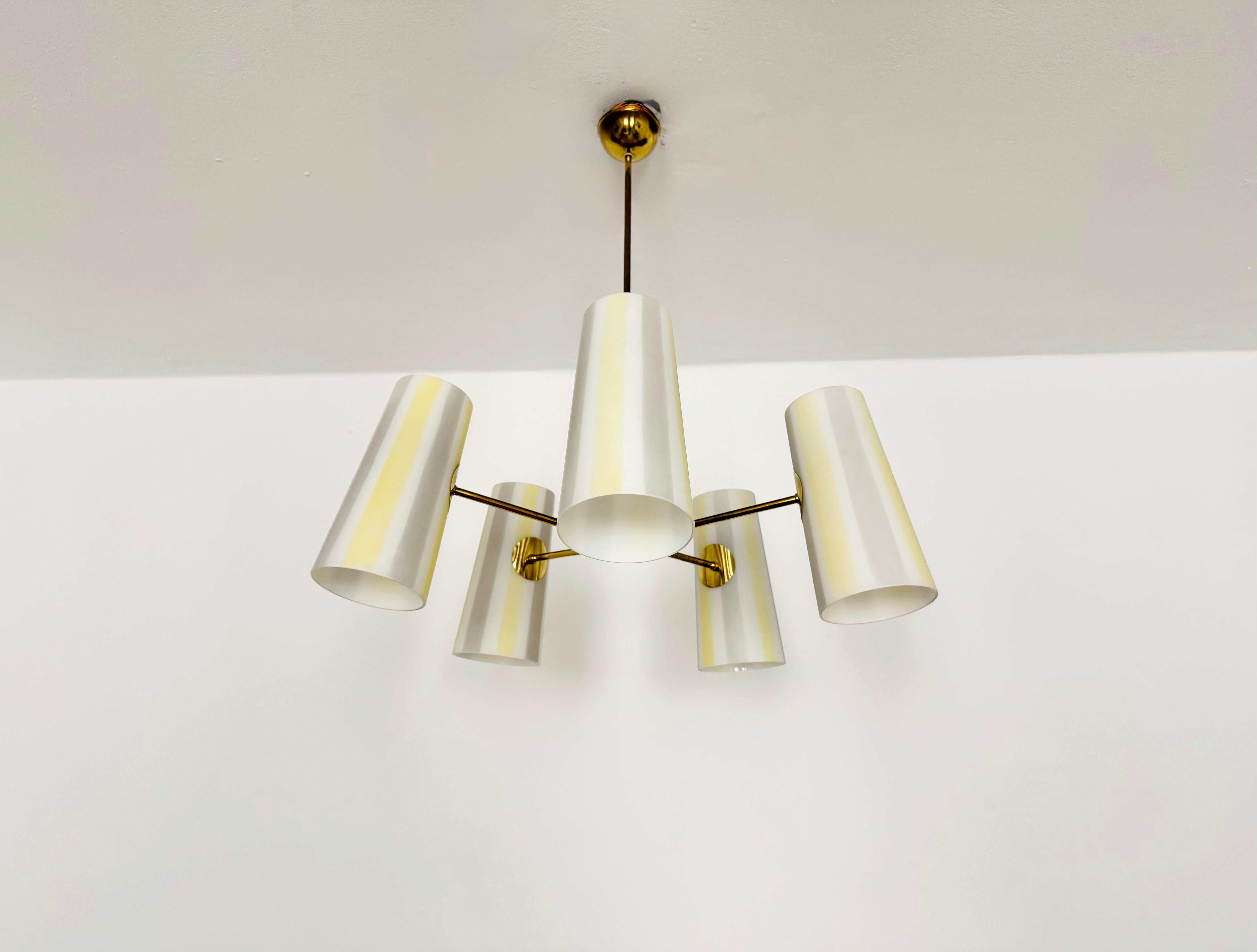 Exceptionally beautiful chandelier from the 1950s.
This lamp is very rare and impresses with its loving details.
A stunning lamp and a true asset to any home.

Manufacturer: Rupert Nikoll

Condition:

Very good vintage condition with slight signs of