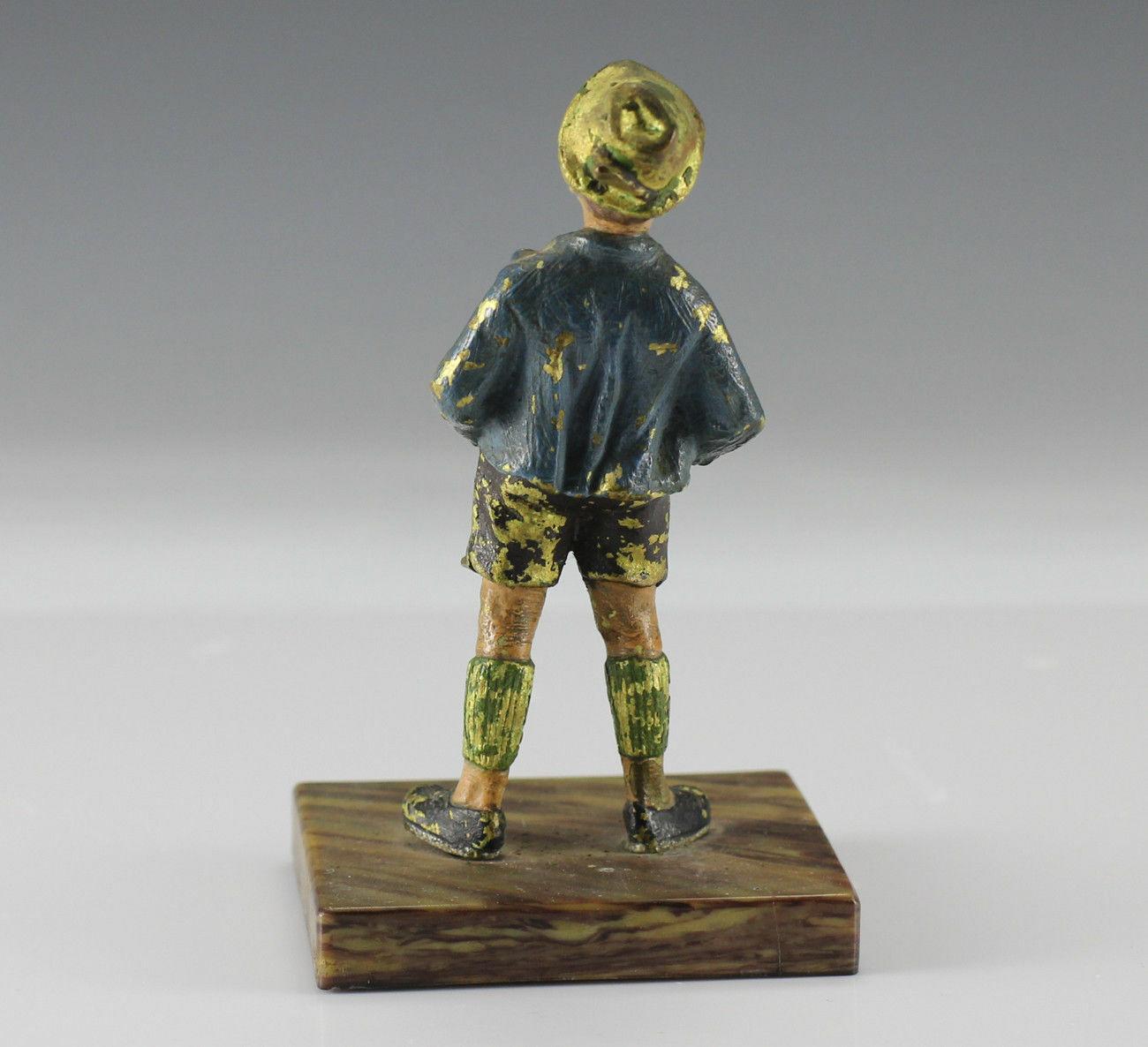 Austrian Bronze Cold Painted Boy in Lederhosen Figurine, 19th century

Hands in pockets, whimsical look on his face. Mounted on square base of some sort of composite material.

Additional Information:
Type: Figurine 
Brand: Unbranded
Primary