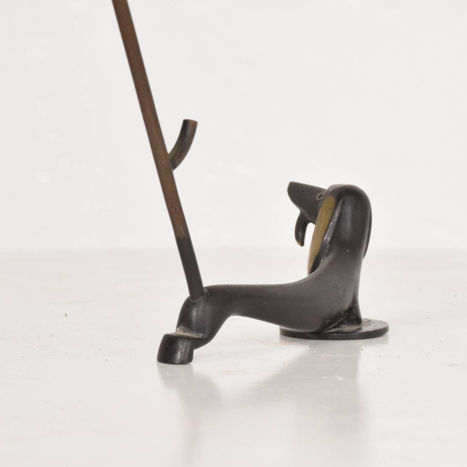 Art Deco Austrian Bronze Dog Laying Ring Holder Paperweight by Richard Rohac, 1940s