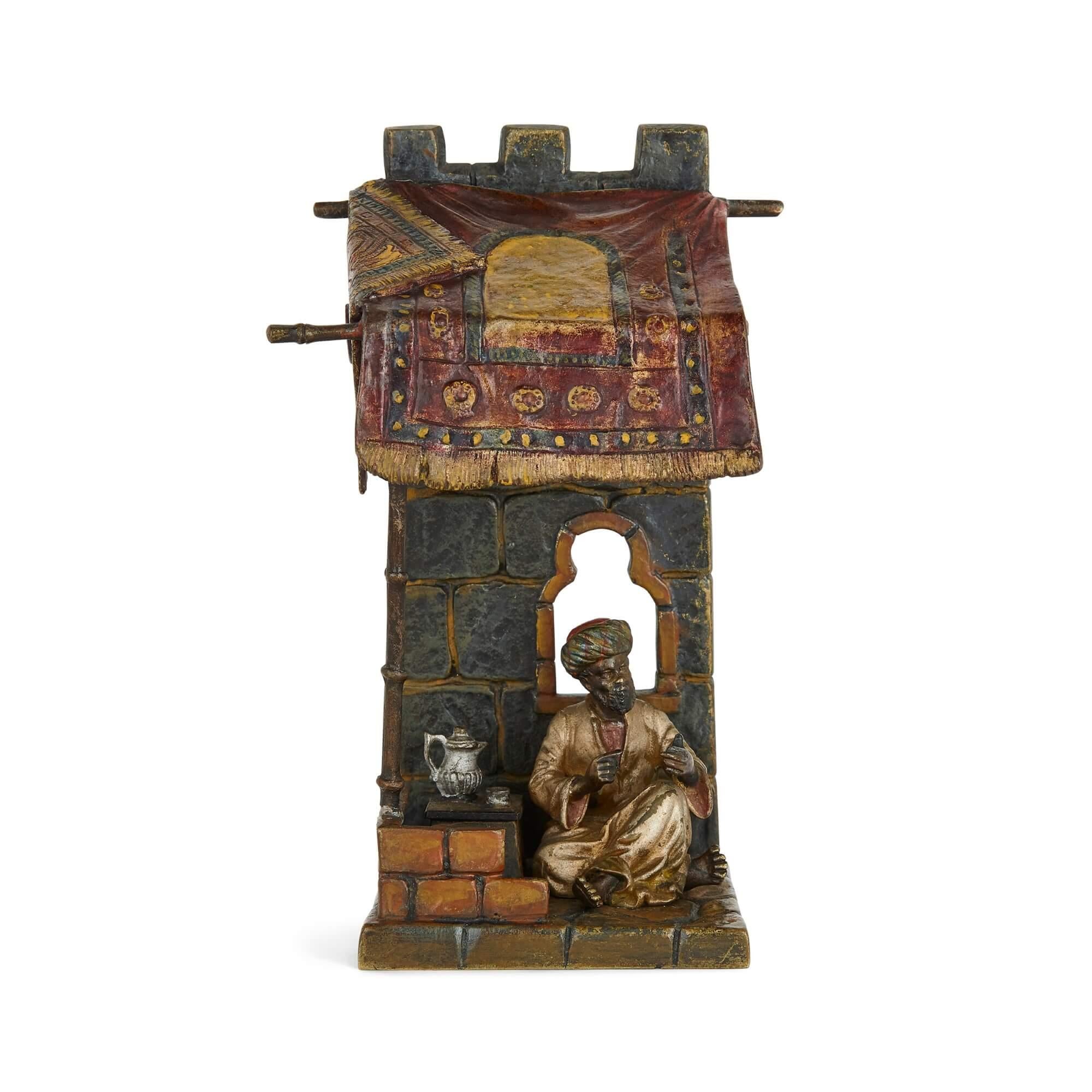 Austrian bronze Orientalist sculptural lamp
Austrian, c. 1910
Height 19cm, width 11cm, depth 7cm

The impressive cold-painted bronze lamp is expressive of the taste that prevailed in Austria during the first decades of the twentieth century. The