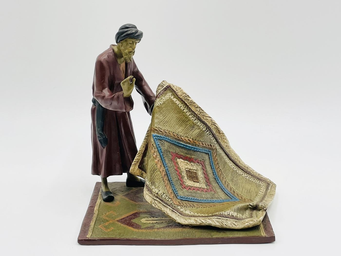 Cold painted Austrian bronze sculpture by Franz Bergman depicting a carpet trader. 
 
The piece shows great attention to detail and craftsmanship.
Signed. 
 
Measurements: 
8 inches high x 8.50 inches wide x 5 inches deep. 

Franz Bergman