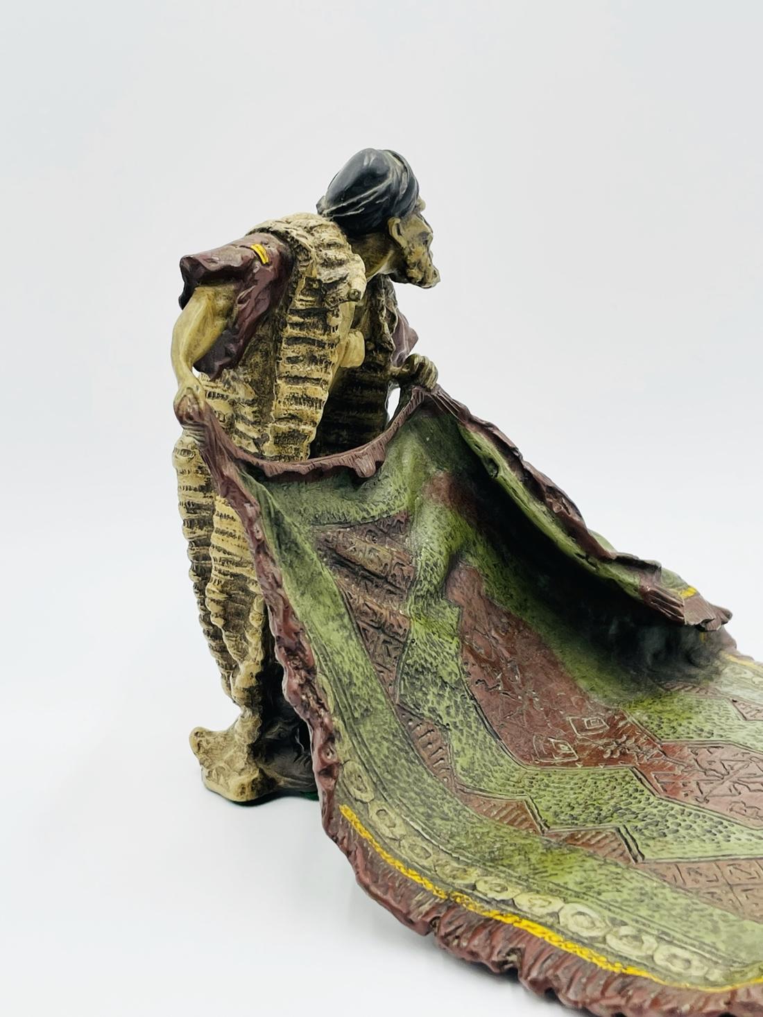 Cold painted Austrian bronze sculpture by Franz Bergman depicting a carpet trader. 
 
 Bears Franz Bergman foundry stamp impressed to underside, with additional impressed signature to lower back of figure. 
 
Measurements: 
6.75 inches high x 7