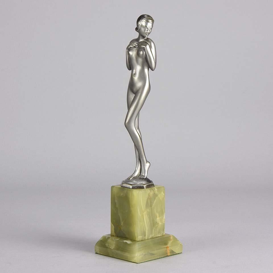 A fabulous cold painted Art Deco bronze figure of a naked beauty in a revealing pose with very fine colour and excellent detail, raised on an onyx base and signed Adolph
Additional information

Height: 27 cm 

Condition: Excellent Original