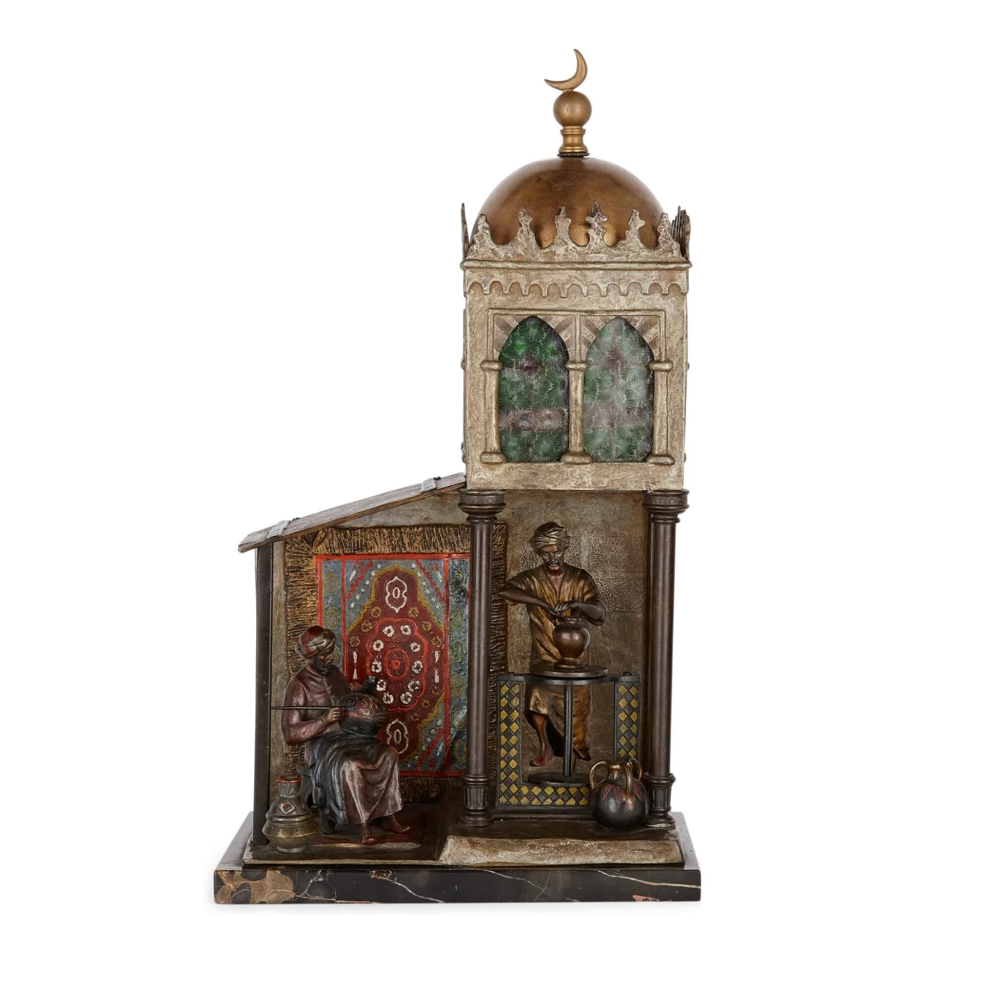 Austrian cold-painted bronze and marble figurative lamp attributed to Bergman 
Austrian, c. 1910
Height 46cm, width 26cm, depth 16cm

This impressive cold-painted bronze lamp showcases a charming and unusual scene of two artists working in a pottery