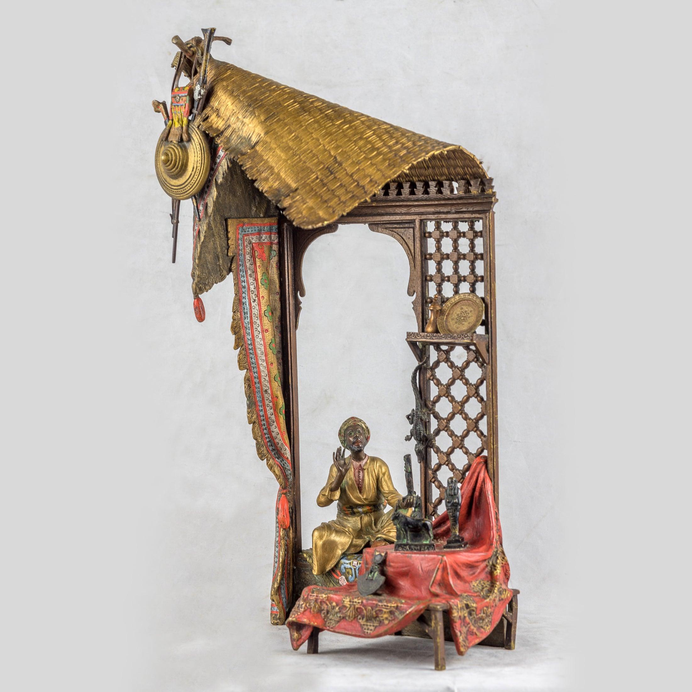 Franz Bergmann
Austrian, (1861-1936)

A fine quality Austrian cold-painted bronze table lamp and sculpture depicting an Arab merchant, stamped to reverse with Bergmann Foundry mark and 