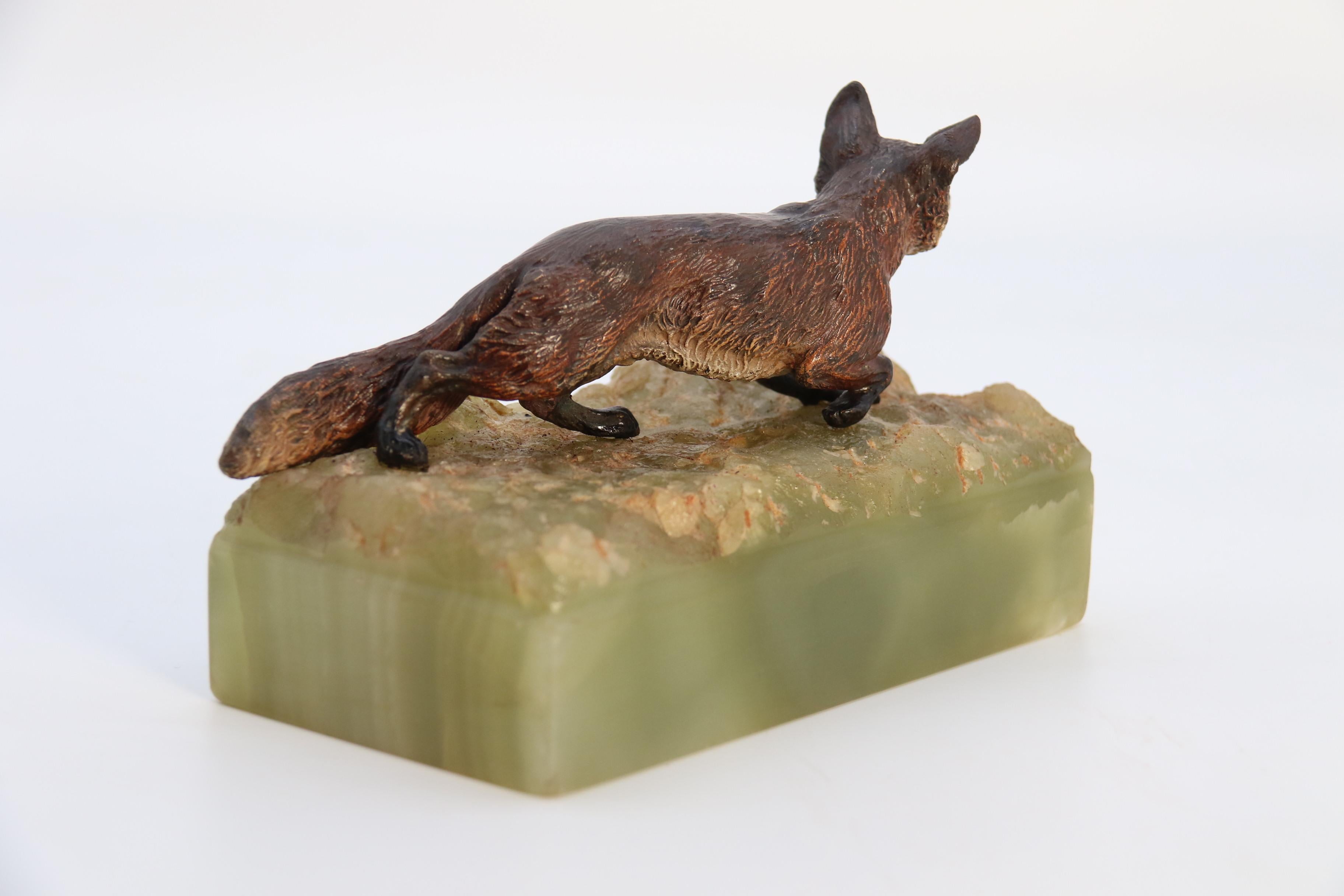 20th Century  Austrian cold painted bronze study of a fox mounted on a green onyx base c 1920 For Sale