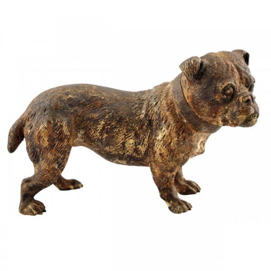 A late 19th century Austrian cold painted bronze model of a terrier dog.

The bronze figure could be of a Staffordshire bull terrier and is modelled standing on all four legs with a cropped tail.

The dog is looking to it's right and has a