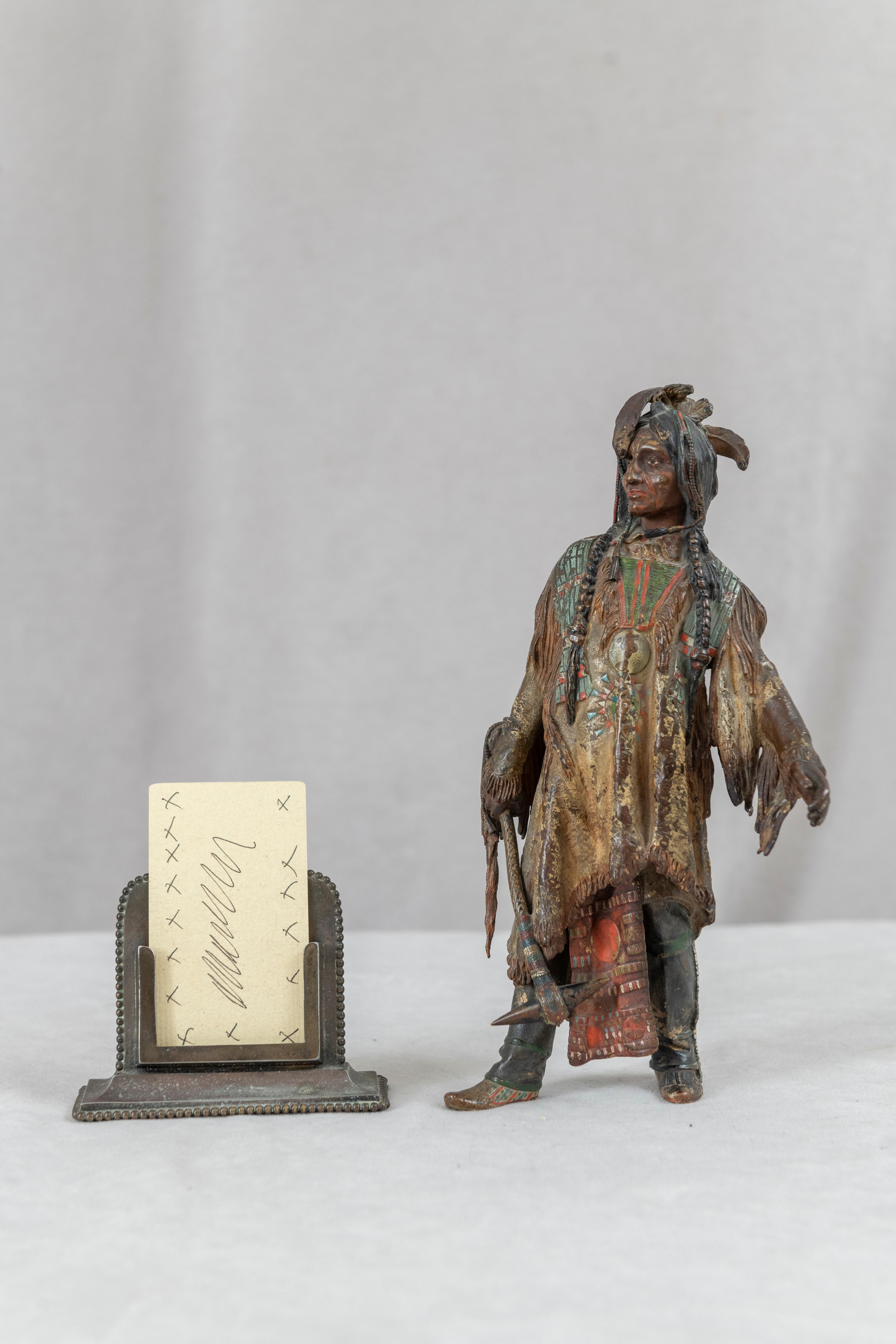  This highly detailed casting of an American Indian was done by one of the noted artists of the old American West, Carl Kauba. The figure also shows off Kauba's attention to detail with his meticulous painted highlights of the figure. While Kauba