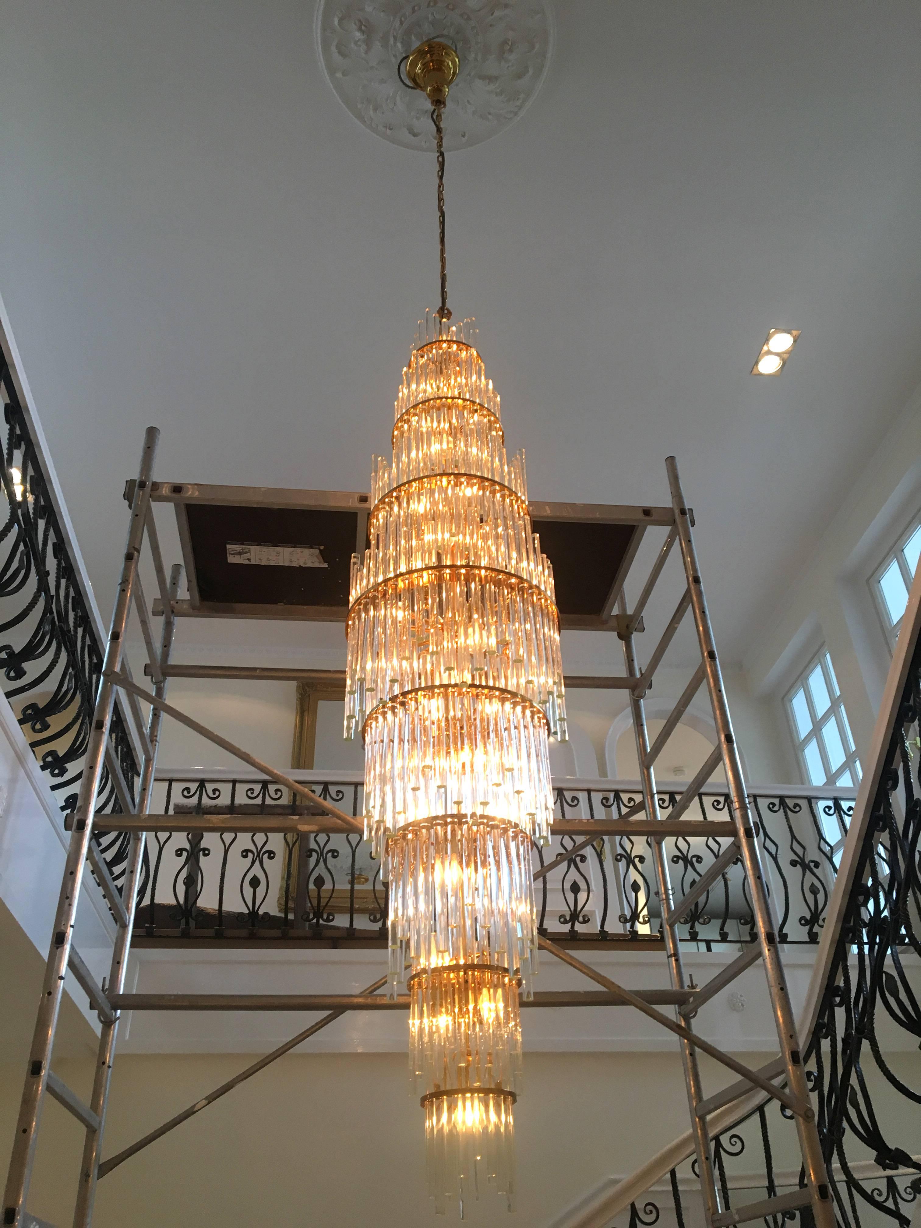 A large 90 inch long tiered crystal and brass chandelier by Christoph Palme.

Austrian, Circa 1980's

Measurements: 
Diameter:  20 Inches
Height: 90 Inches (110 inch)

Chrystal glass and brass.